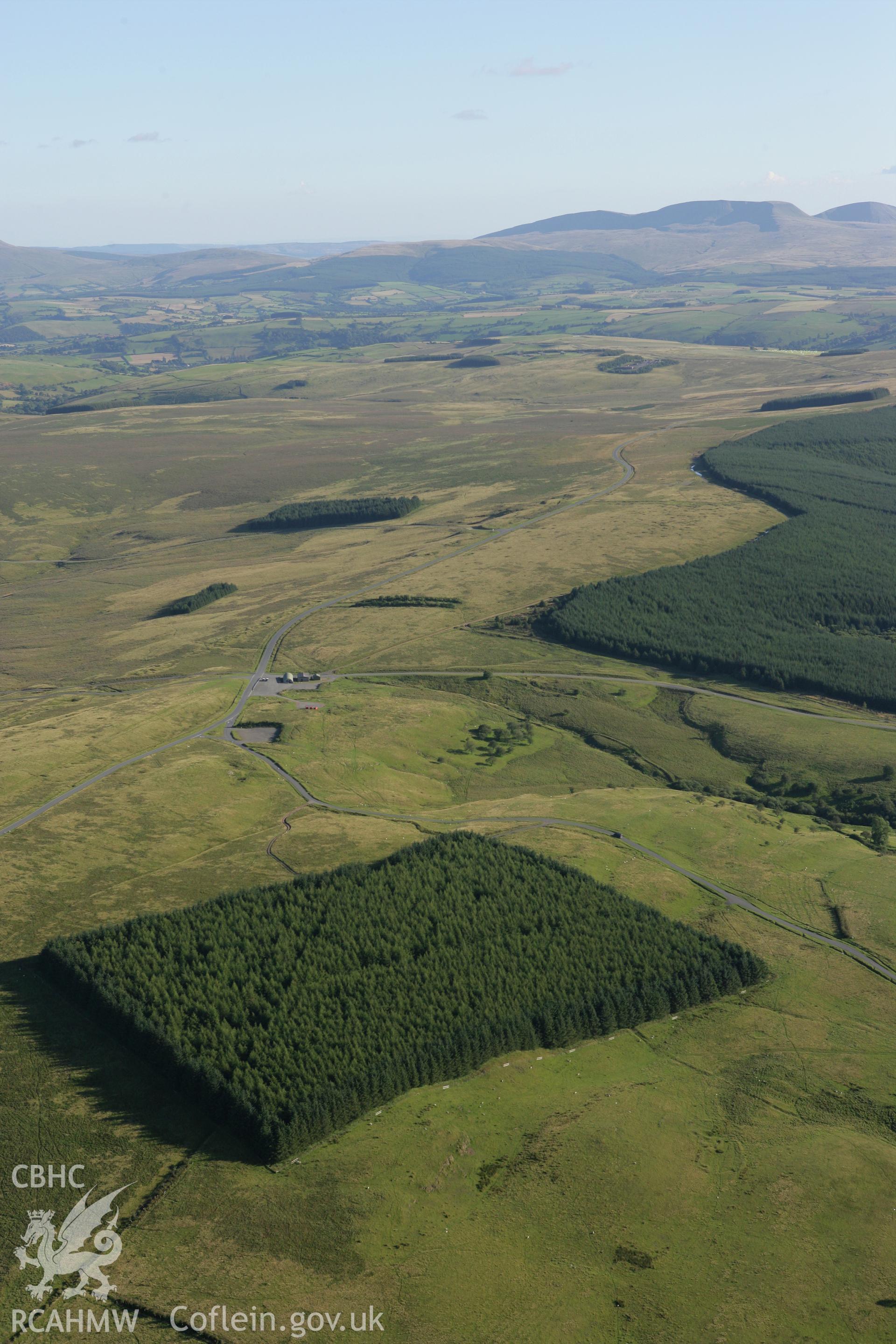 RCAHMW colour oblique aerial photograph of Sennybridge Military Training Area, Mynydd Epynt, showing the Dixie's Corner landscape. Taken on 08 August 2007 by Toby Driver