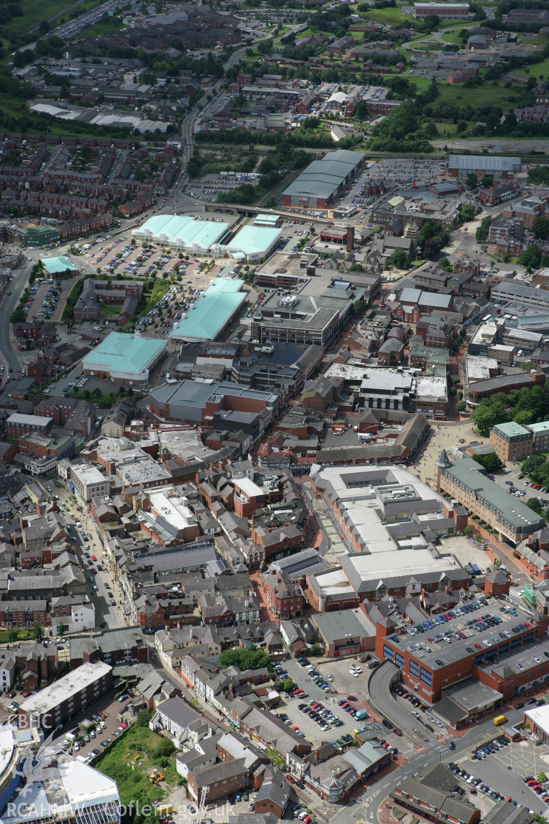 RCAHMW colour oblique aerial photograph of Wrexham showing the town centre. Taken on 24 July 2007 by Toby Driver