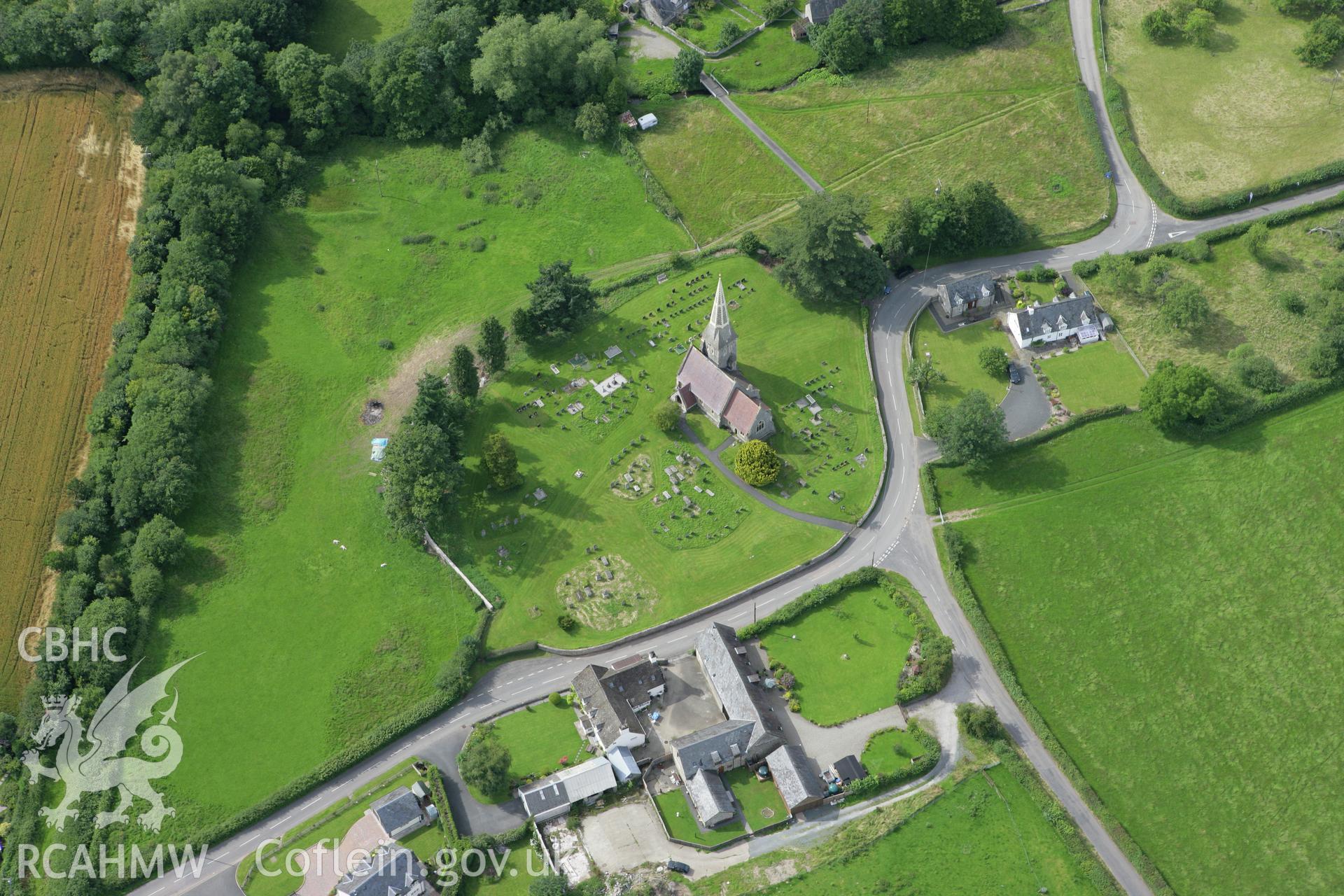 RCAHMW colour oblique aerial photograph of St. Cynog's Church, Boughrood. Taken on 09 July 2007 by Toby Driver