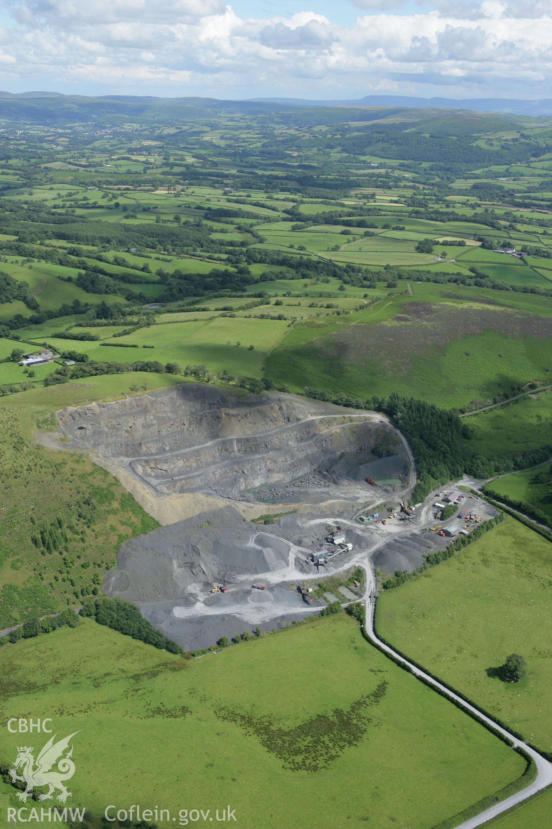 RCAHMW colour oblique aerial photograph of Cribarth Quarry. Taken on 09 July 2007 by Toby Driver