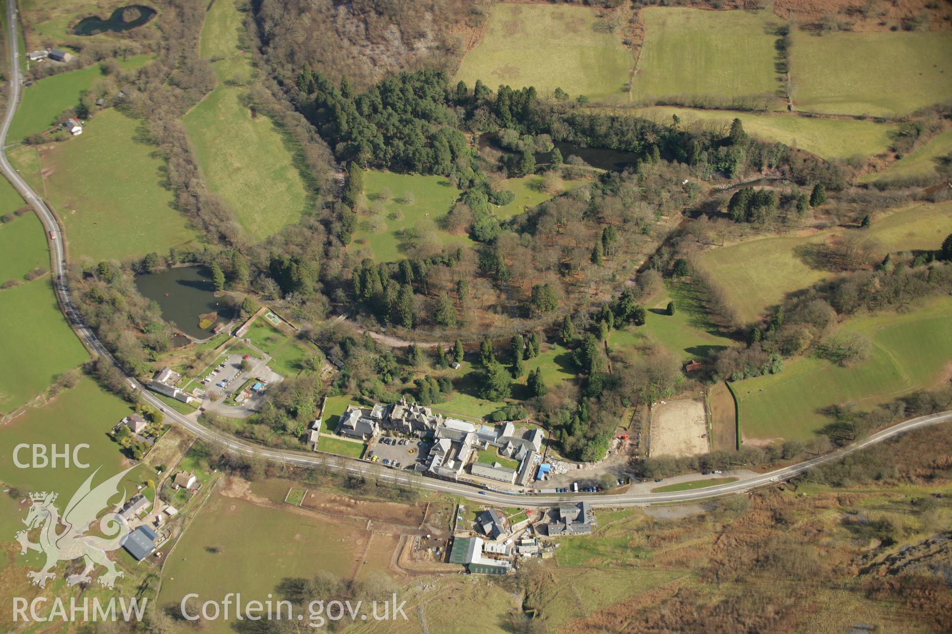 RCAHMW colour oblique aerial photograph of Craig-y-Nos Castle Garden, Glyntawe. Taken on 21 March 2007 by Toby Driver