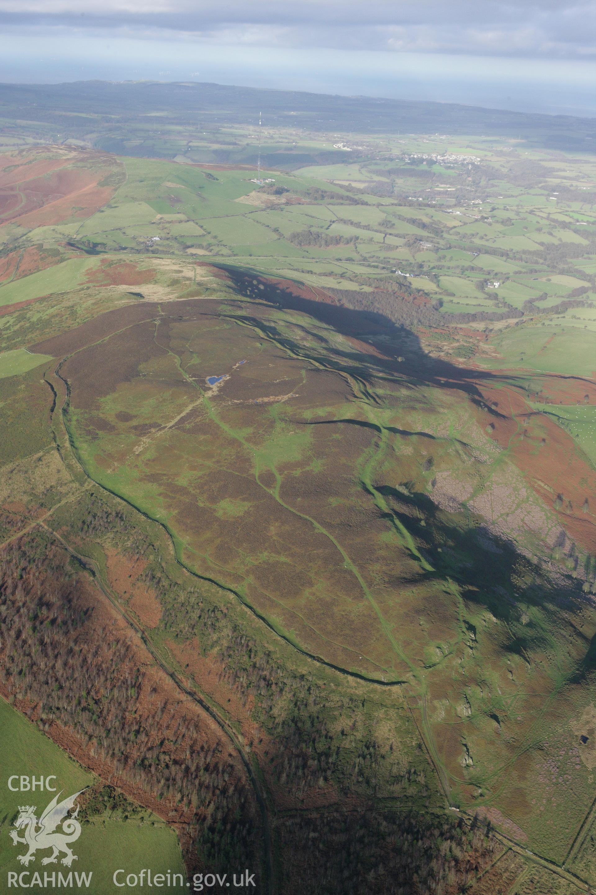 RCAHMW colour oblique photograph of Penycloddiau hillfort. Taken by Toby Driver on 11/12/2007.