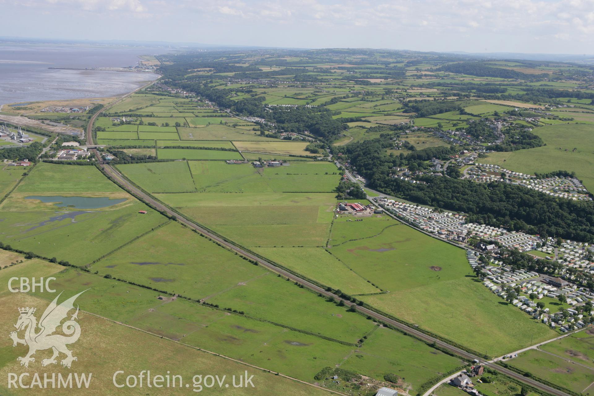 RCAHMW colour oblique aerial photograph of Talacre Station and Tynymorfa landscape. Taken on 31 July 2007 by Toby Driver