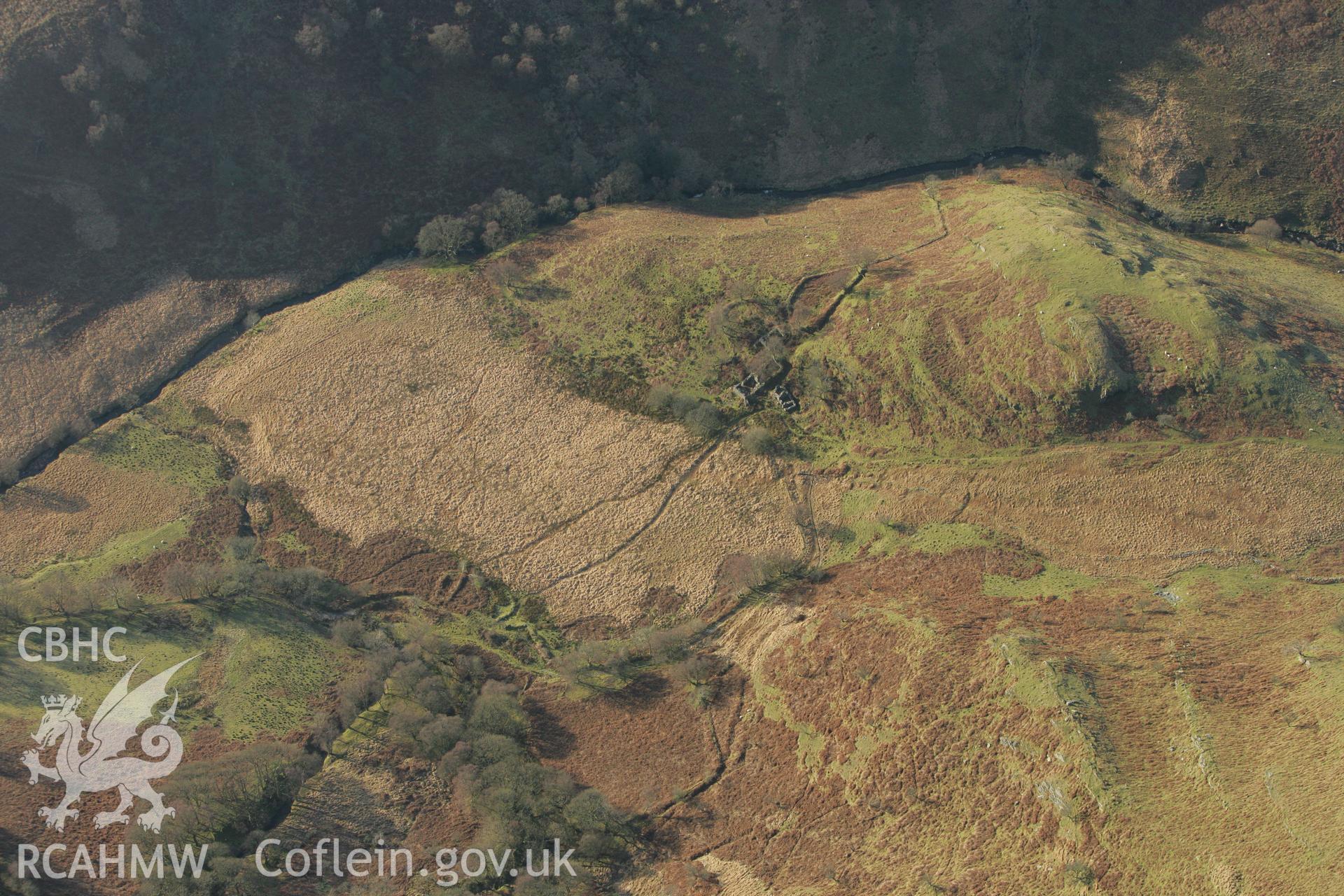 RCAHMW colour oblique photograph of Dinas Foelfraeth farmstead. Taken by Toby Driver on 20/12/2007.