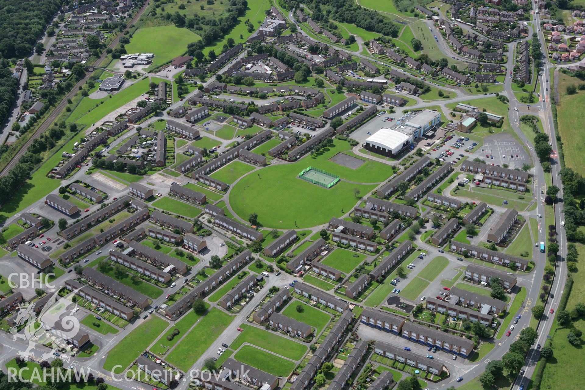 RCAHMW colour oblique aerial photograph of Plas Madoc Housing Estate. Taken on 24 July 2007 by Toby Driver