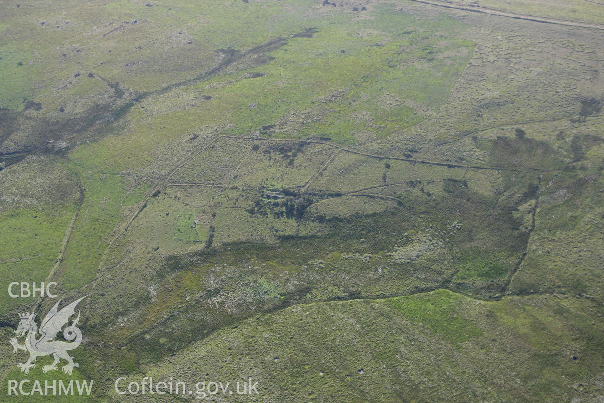 RCAHMW colour oblique aerial photograph of Glan-y-rhyd Deserted Farmstead. Taken on 08 August 2007 by Toby Driver