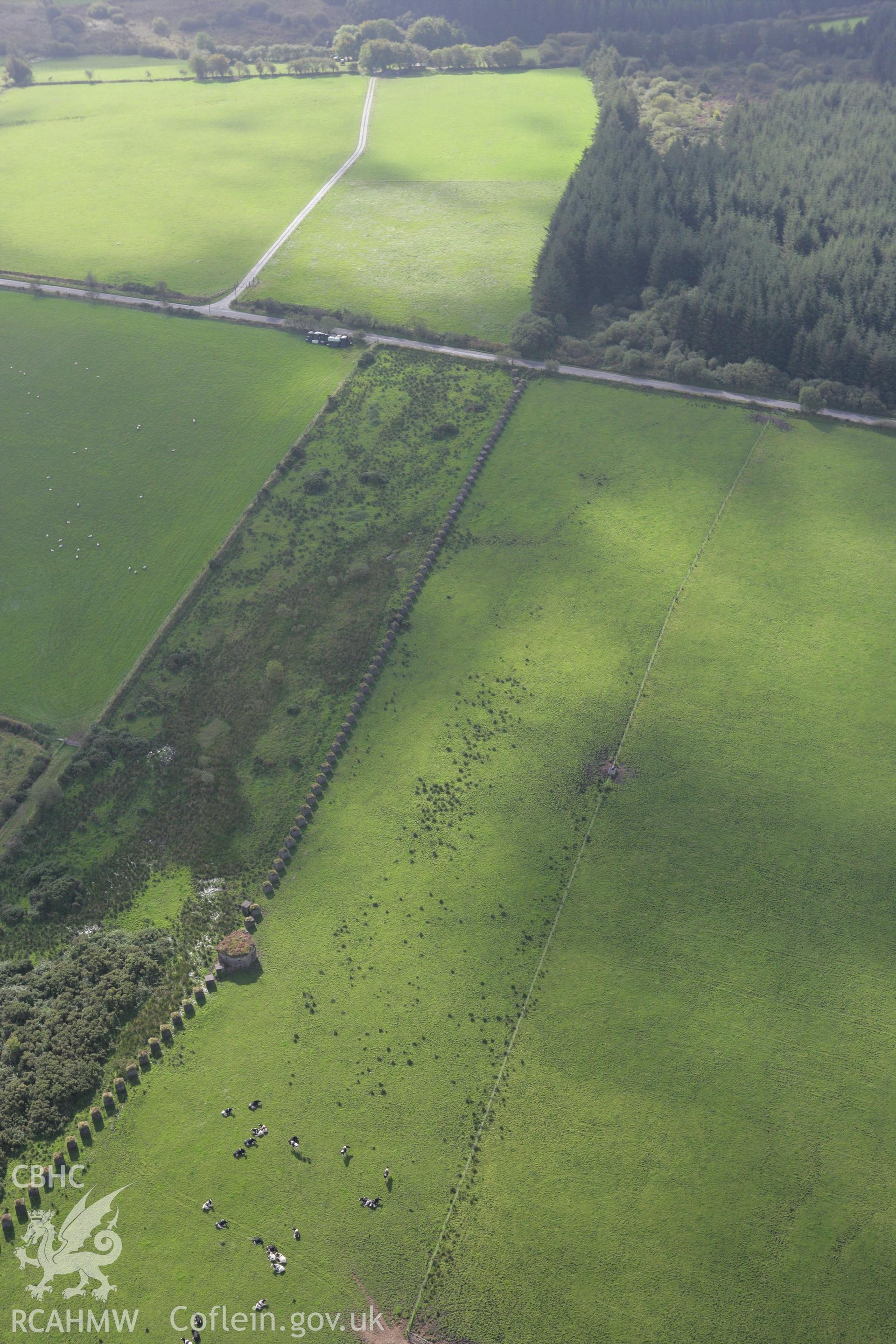 RCAHMW colour oblique photograph of Rhos-Llangeler stop line, anti tank ditch. Taken by Toby Driver on 11/09/2007.