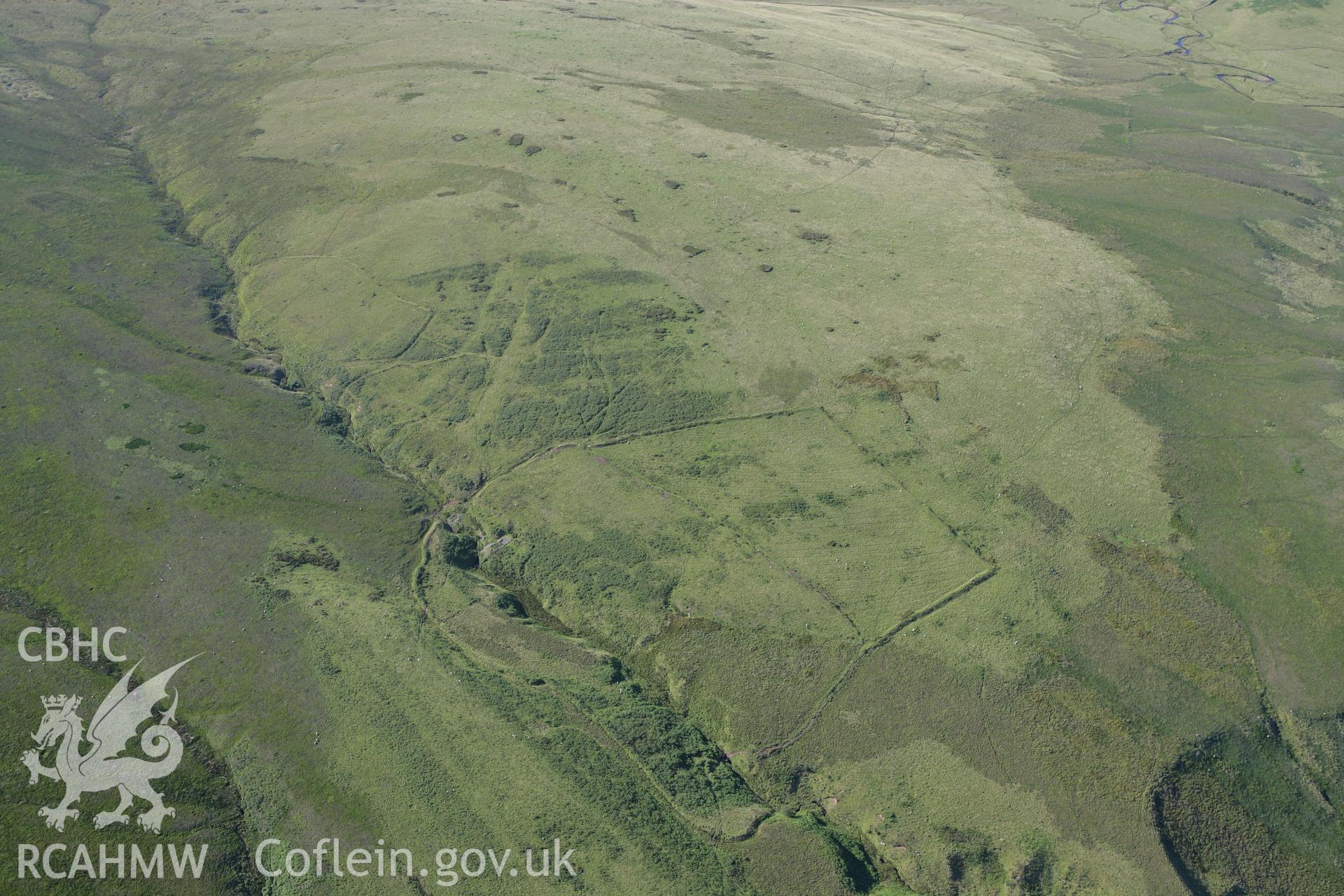RCAHMW colour oblique aerial photograph of Pwll Cam West. Taken on 08 August 2007 by Toby Driver