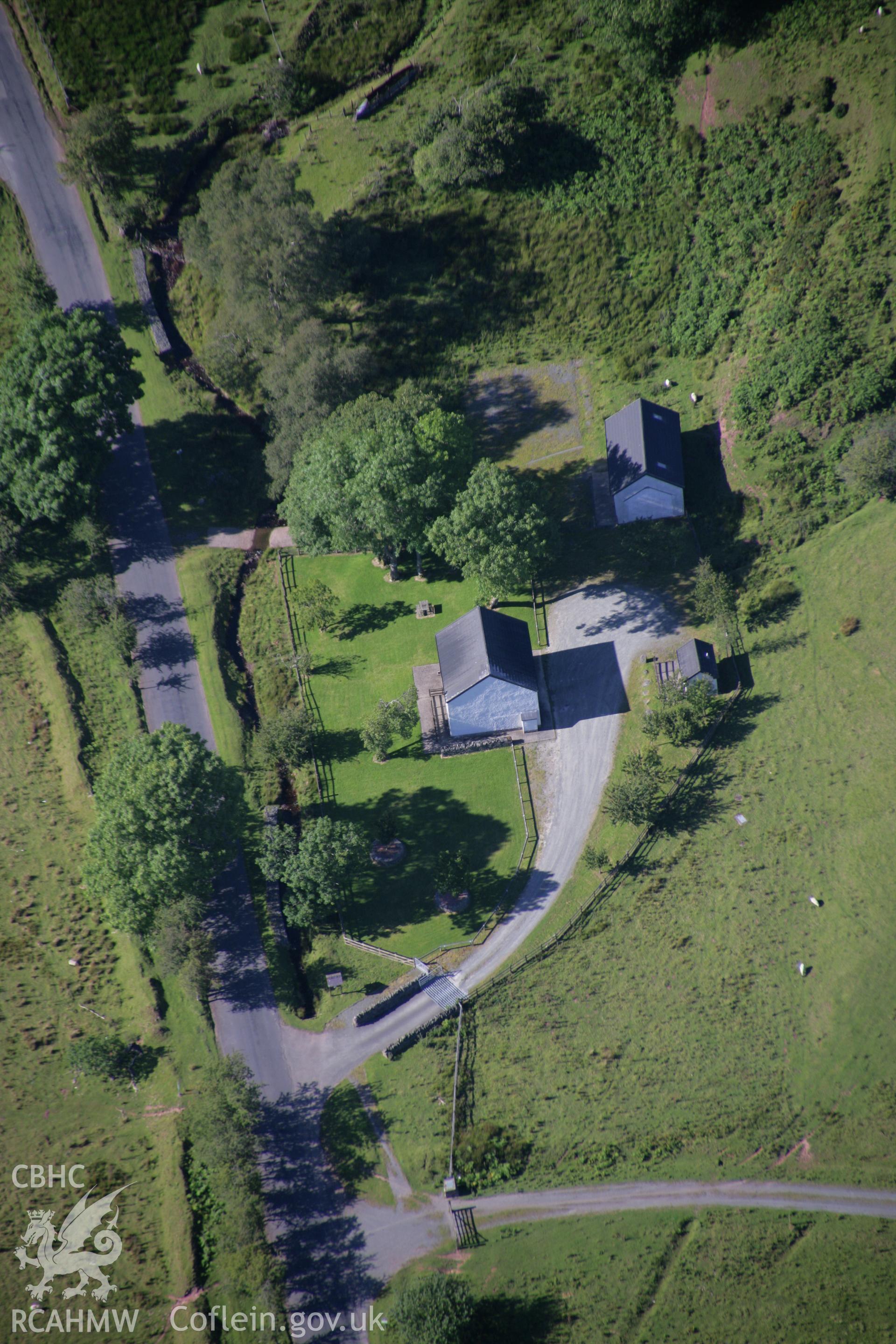 RCAHMW colour oblique aerial photograph of the army visitor centre in the former Disgwylfa Farmstead. Taken on 08 August 2007 by Toby Driver
