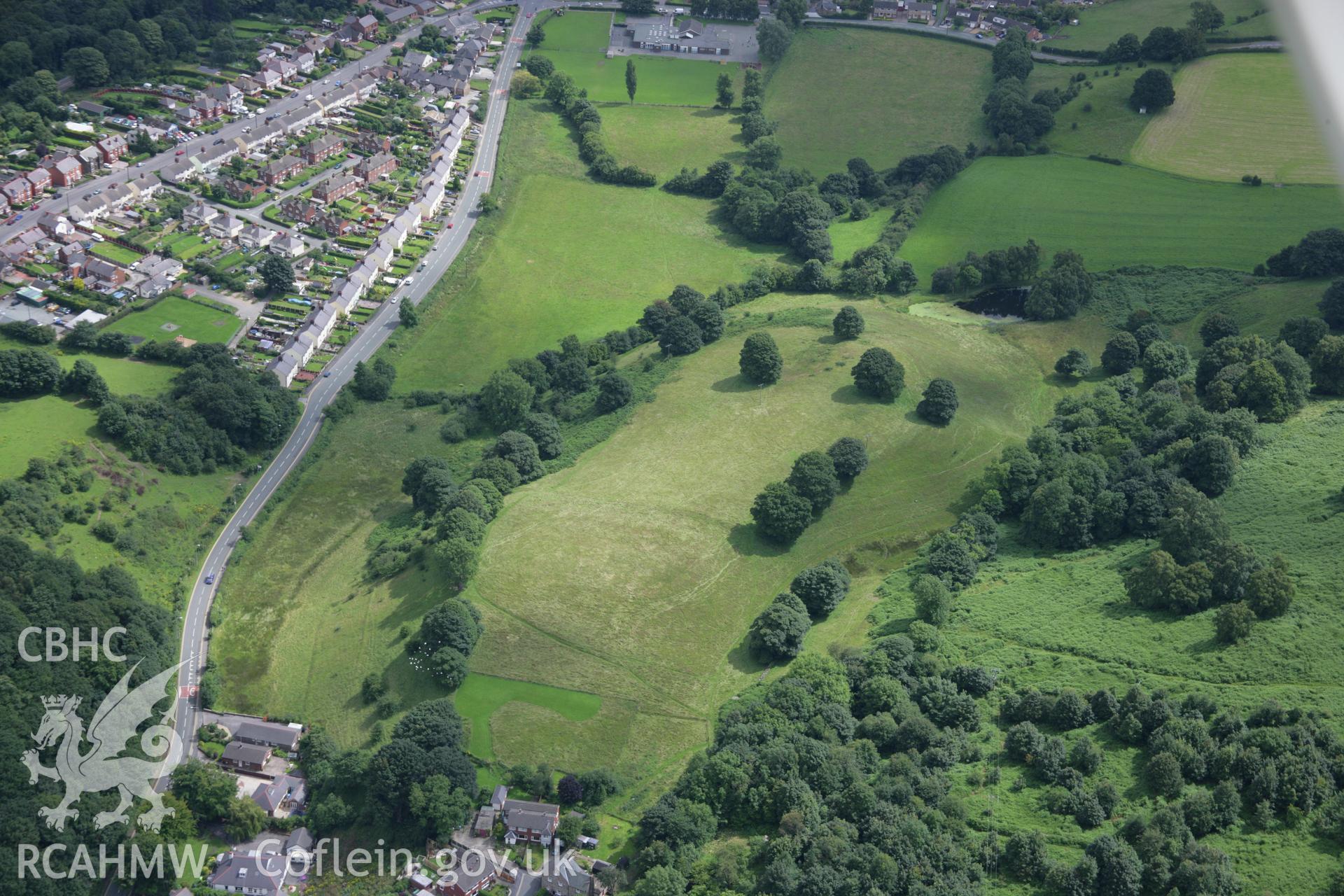 RCAHMW colour oblique aerial photograph of Caergwrle Castle with possible earthworks to the south-west. Taken on 24 July 2007 by Toby Driver