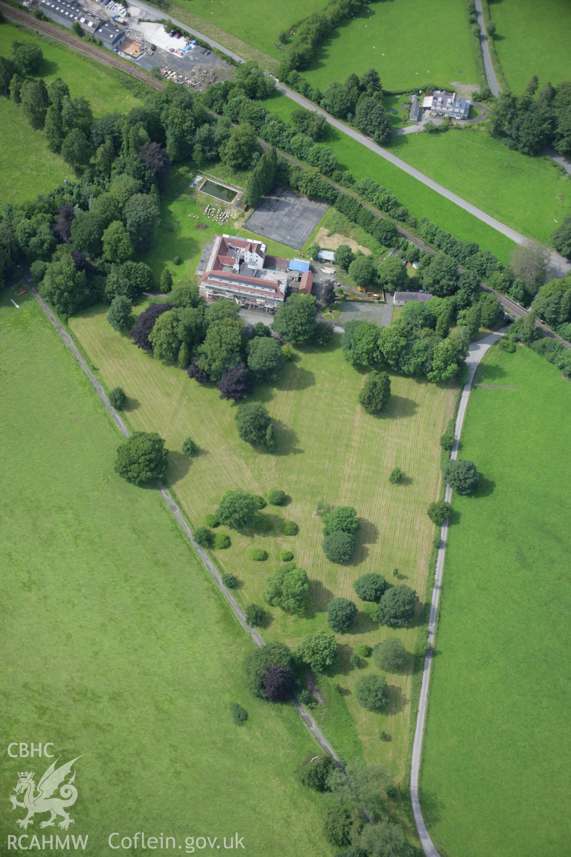 RCAHMW colour oblique aerial photograph of Abernant Lake Hotel. Taken on 09 July 2007 by Toby Driver