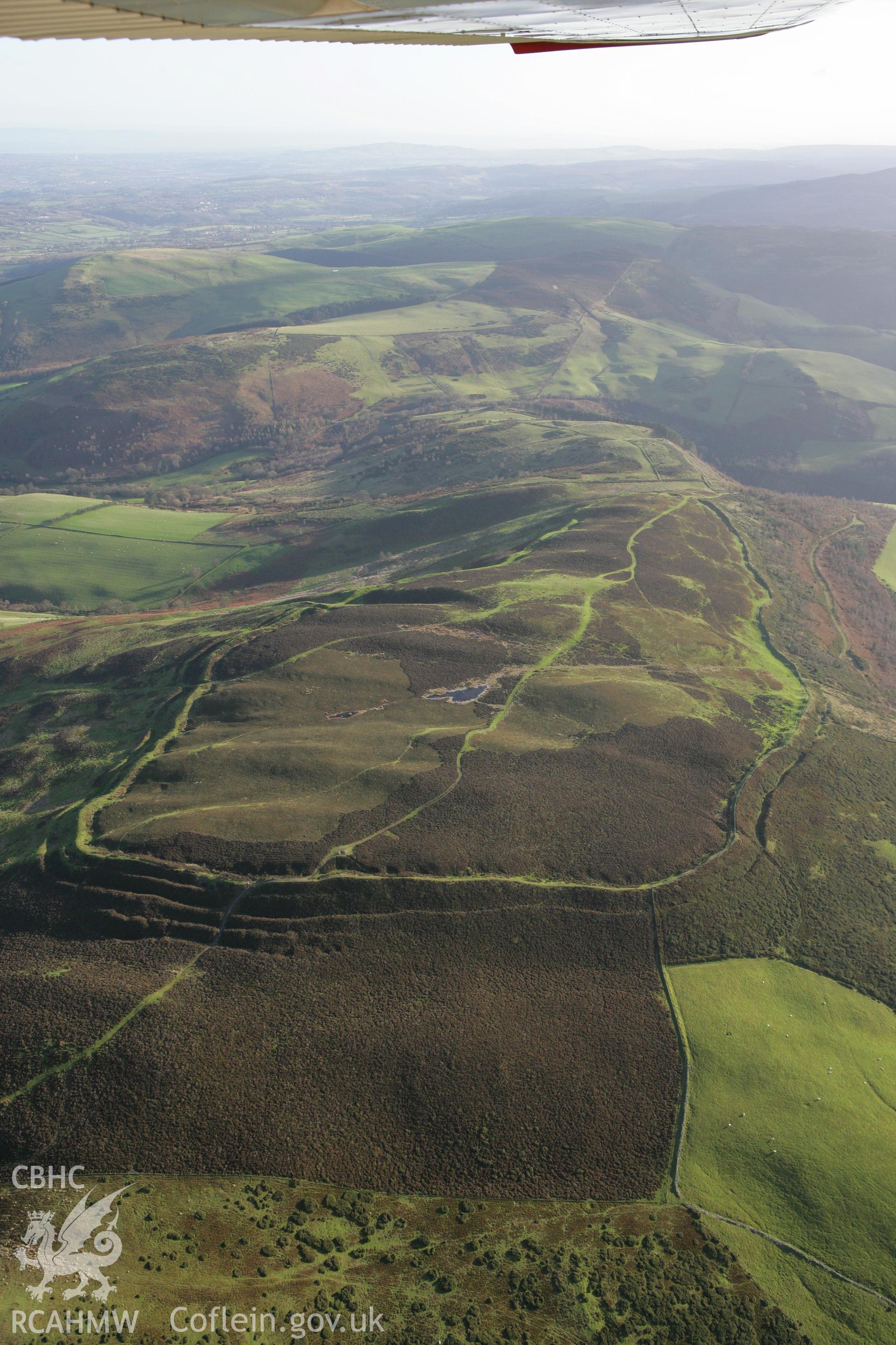 RCAHMW colour oblique photograph of Penycloddiau hillfort. Taken by Toby Driver on 11/12/2007.