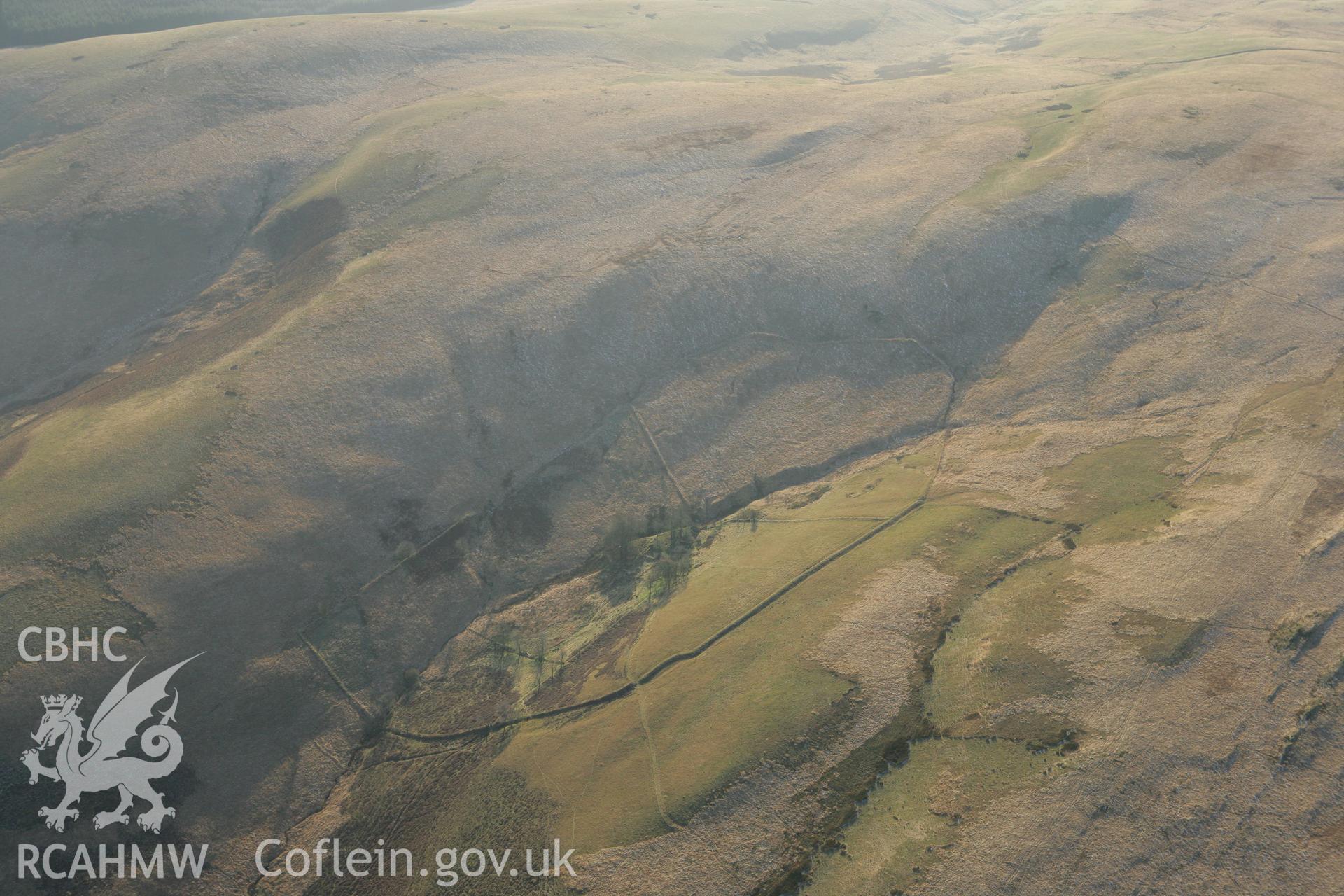 RCAHMW colour oblique photograph of Nant Coli deserted rural farmstead. Taken by Toby Driver on 20/12/2007.