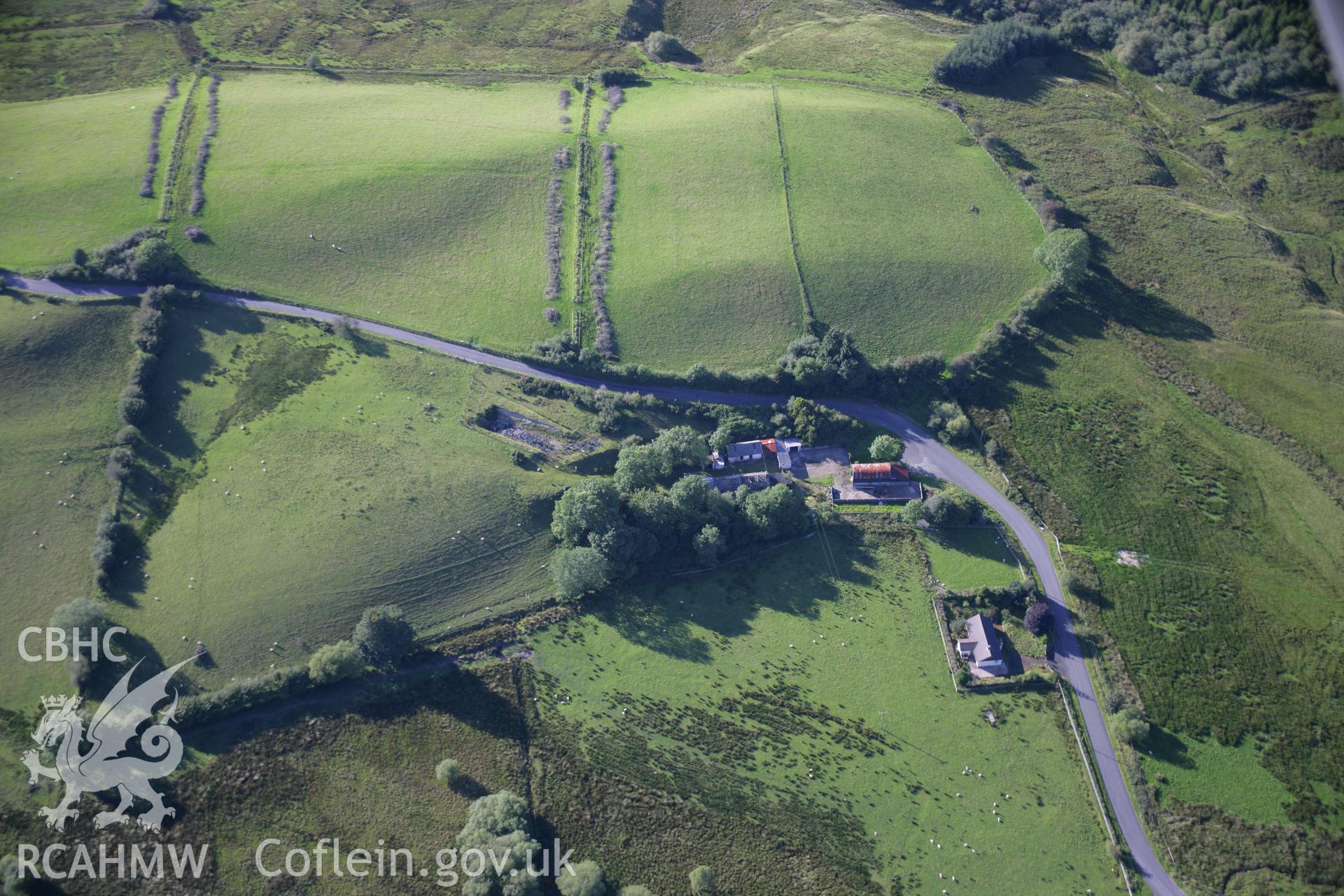 RCAHMW colour oblique aerial photograph of Spite Inn. Taken on 08 August 2007 by Toby Driver
