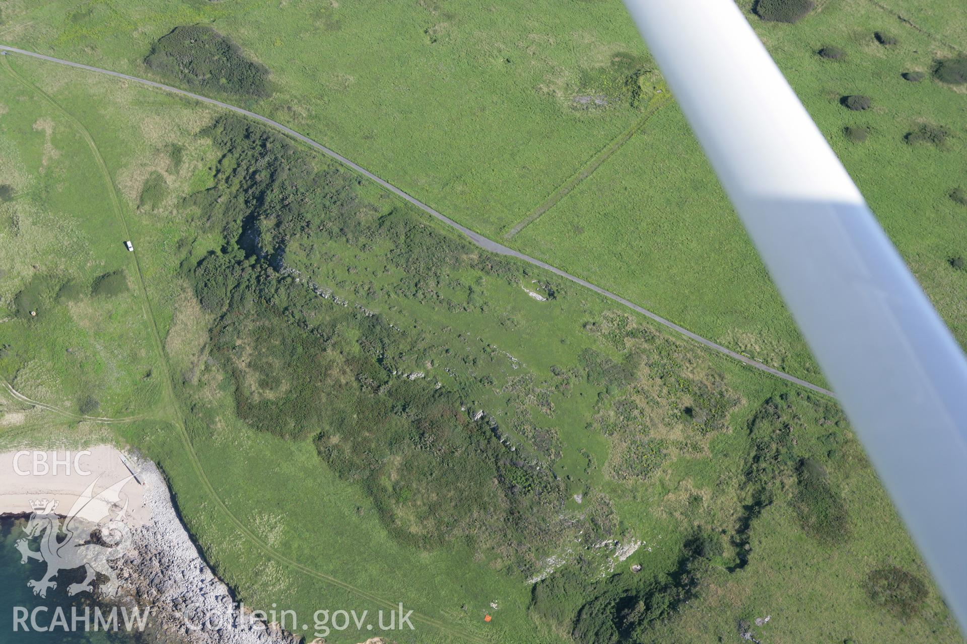 RCAHMW colour oblique aerial photograph of Linney Head Barrow. Taken on 30 July 2007 by Toby Driver