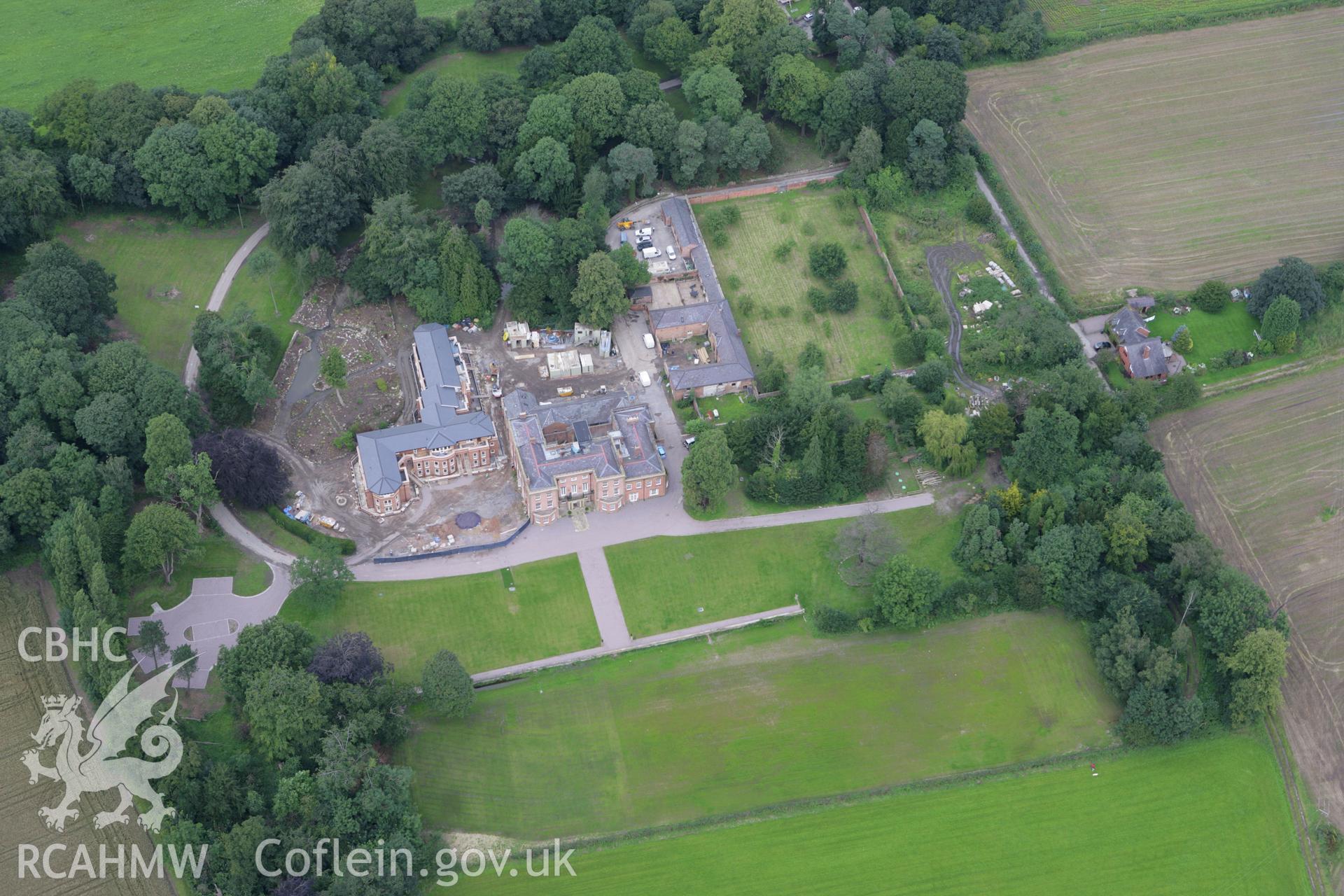 RCAHMW colour oblique aerial photograph of Trevalyn House, Rossett. Taken on 24 July 2007 by Toby Driver