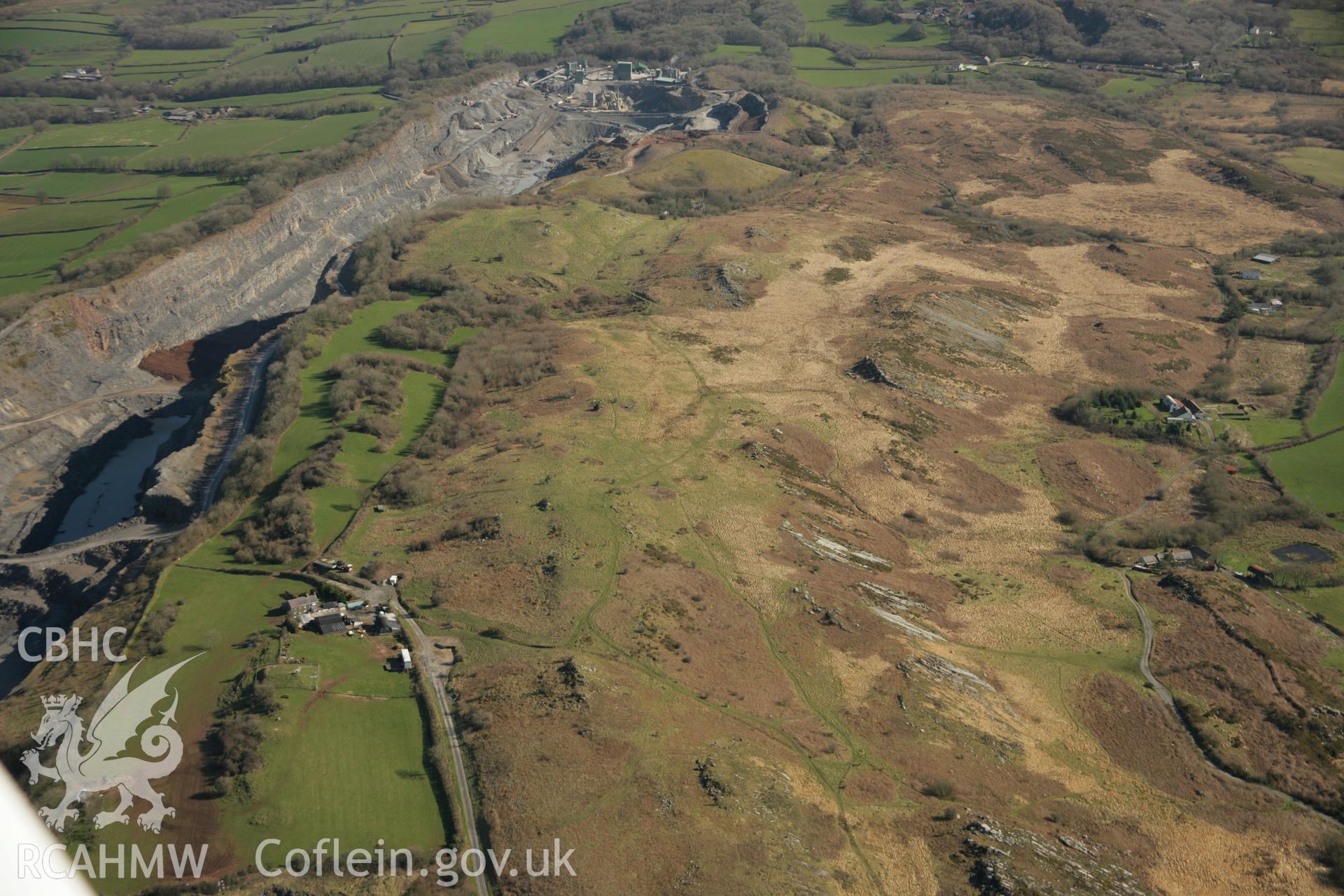 RCAHMW colour oblique aerial photograph of Mynydd Llangyndeyrn Cairn II. Taken on 21 March 2007 by Toby Driver