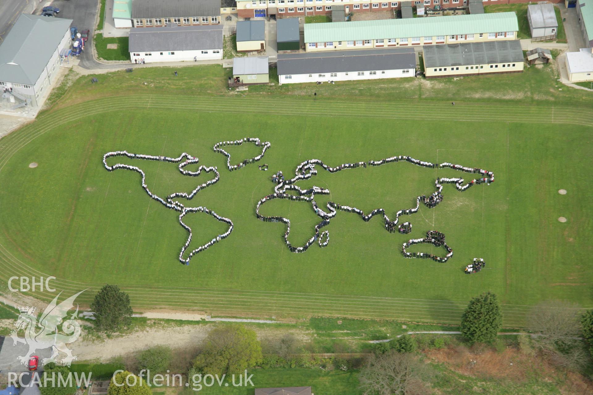 RCAHMW colour oblique aerial photograph of Penglais Comprehensive School, World Map of 1500 pupils. Taken on 17 April 2007 by Toby Driver