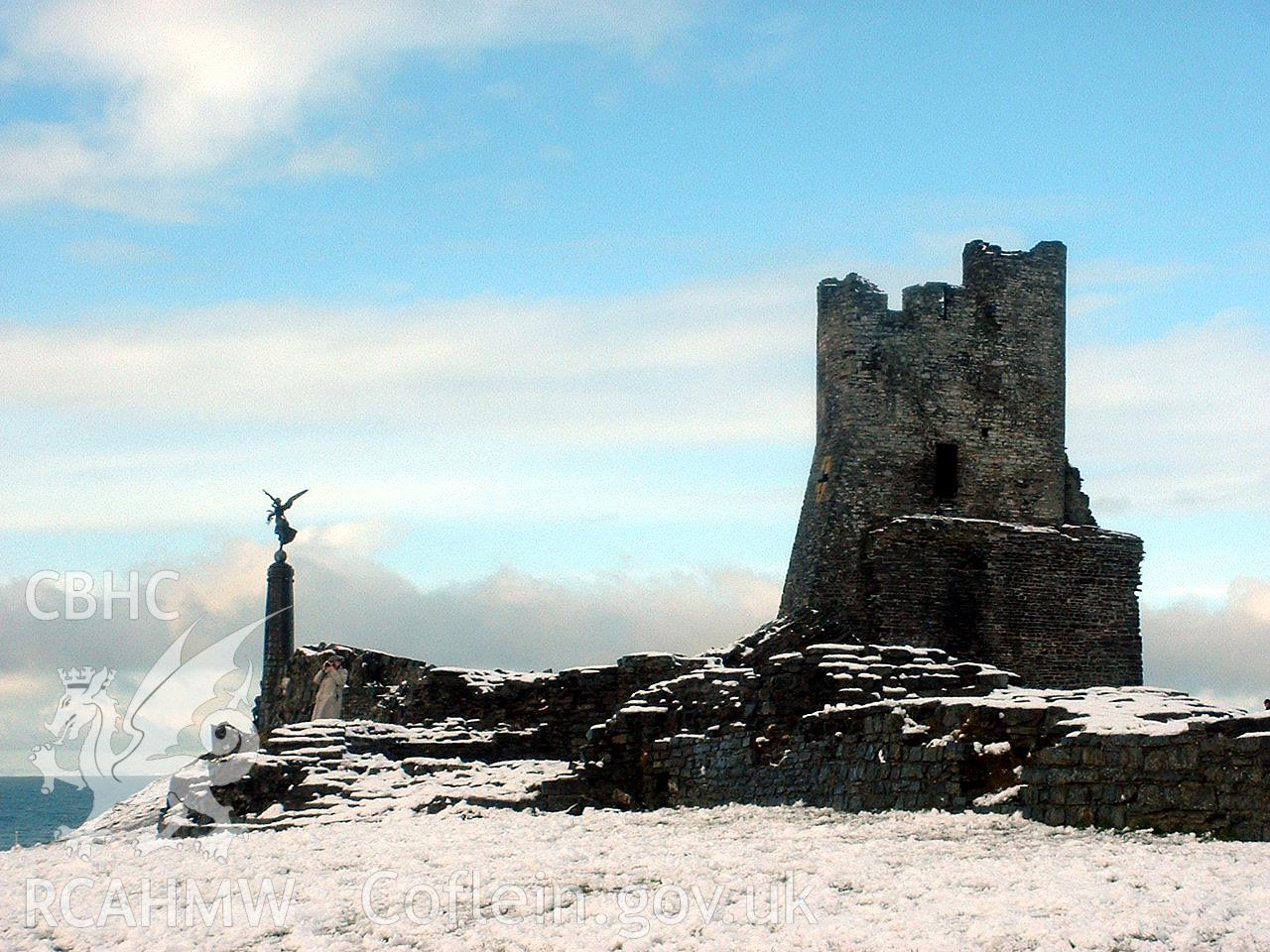 Digital colour photograph of Aberystwyth Castle, with war memorial, in snow, by Charles Green, 2004.