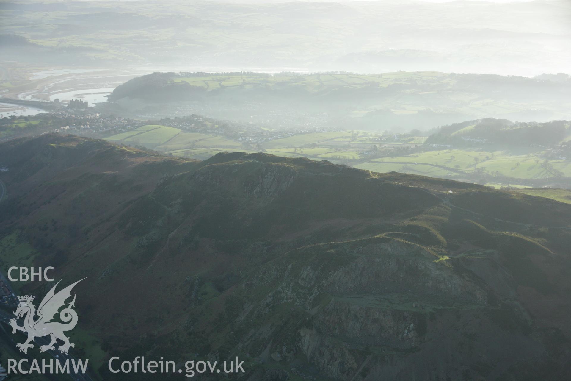 RCAHMW colour oblique aerial photograph of Castell Caer Seion, Conwy Mountain. Taken on 25 January 2007 by Toby Driver