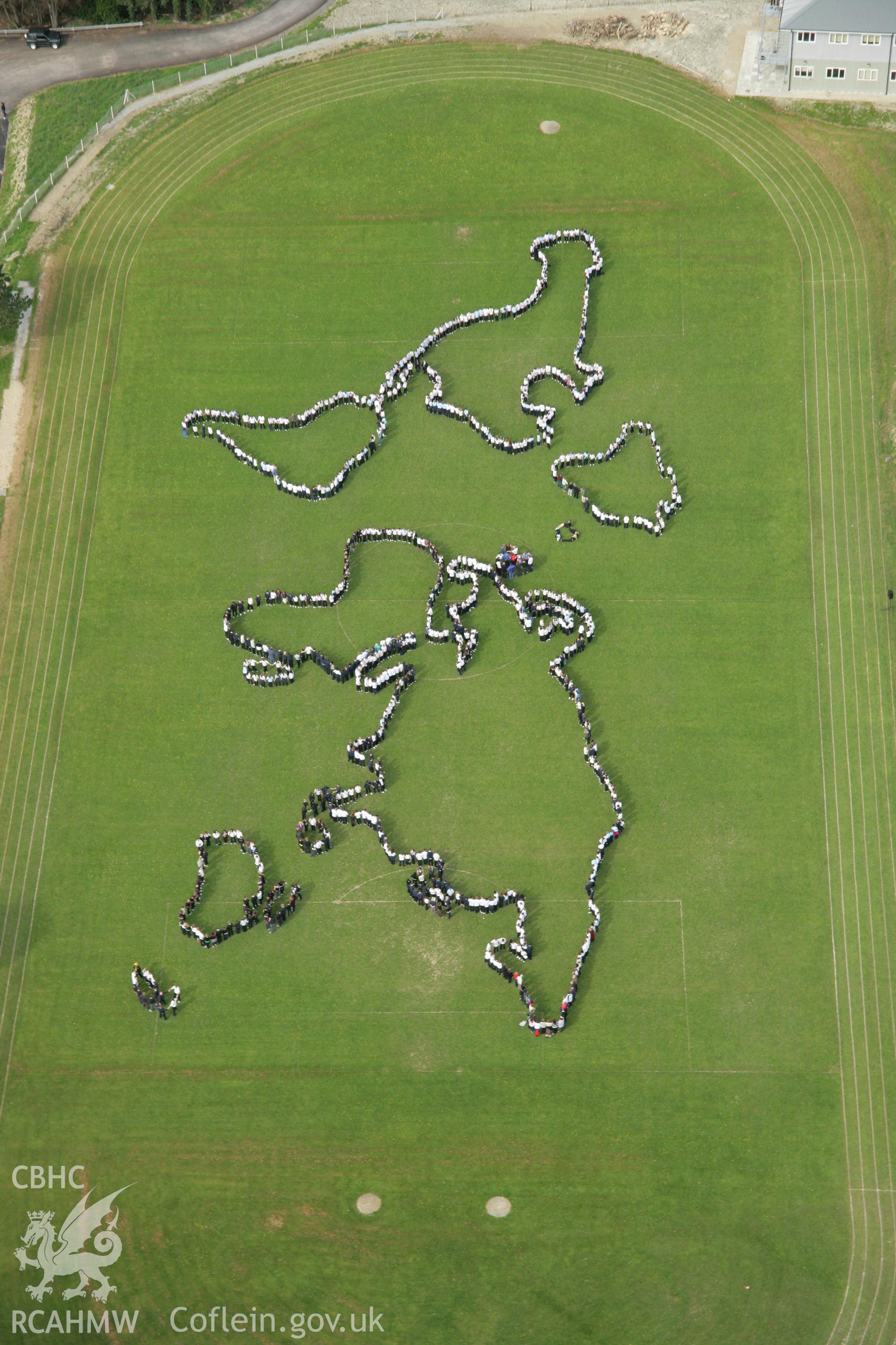 RCAHMW colour oblique aerial photograph of Penglais Comprehensive School, World Map of 1500 pupils. Taken on 17 April 2007 by Toby Driver