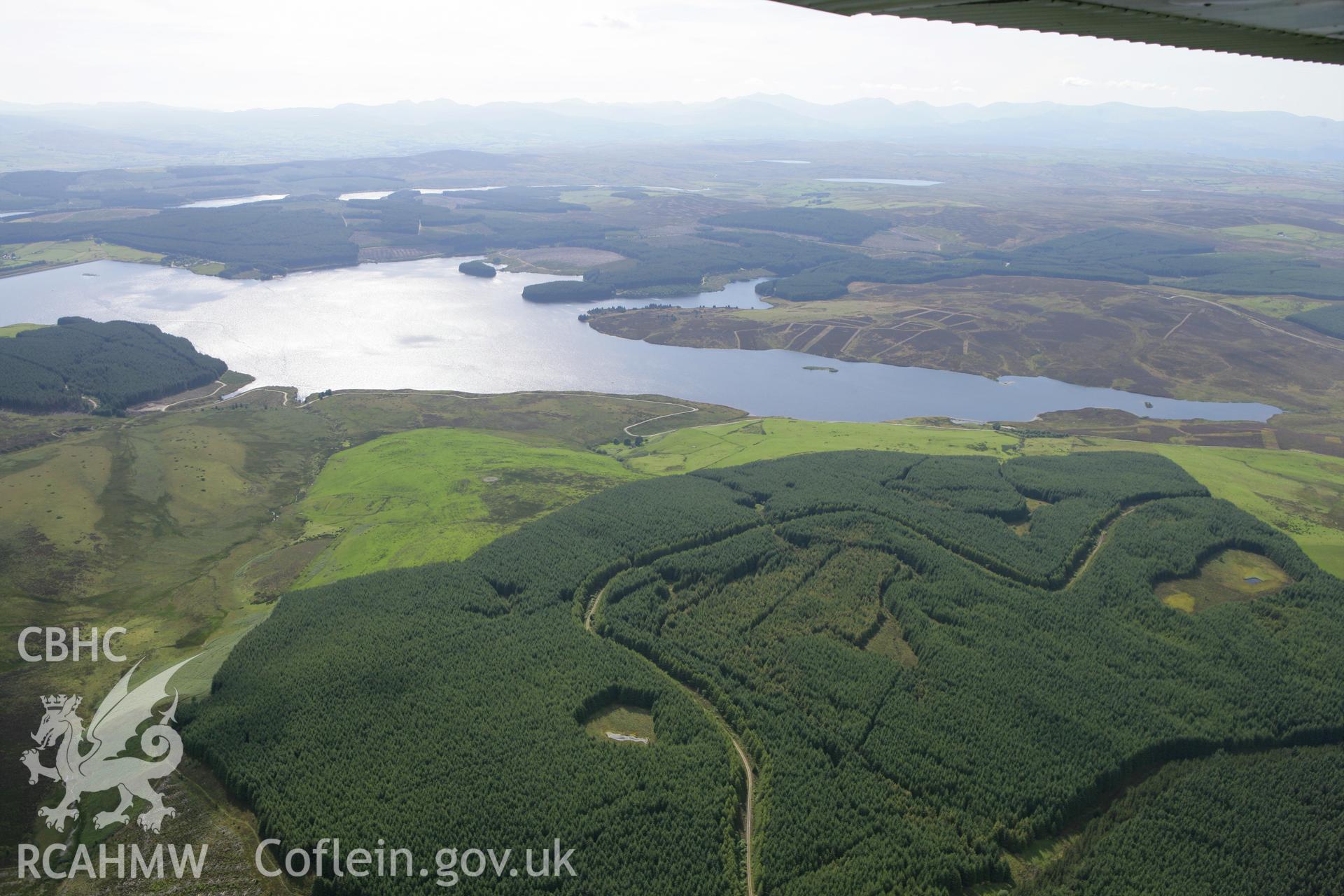 RCAHMW colour oblique aerial photograph showing landscape of Llyn Brenig. Taken on 31 July 2007 by Toby Driver