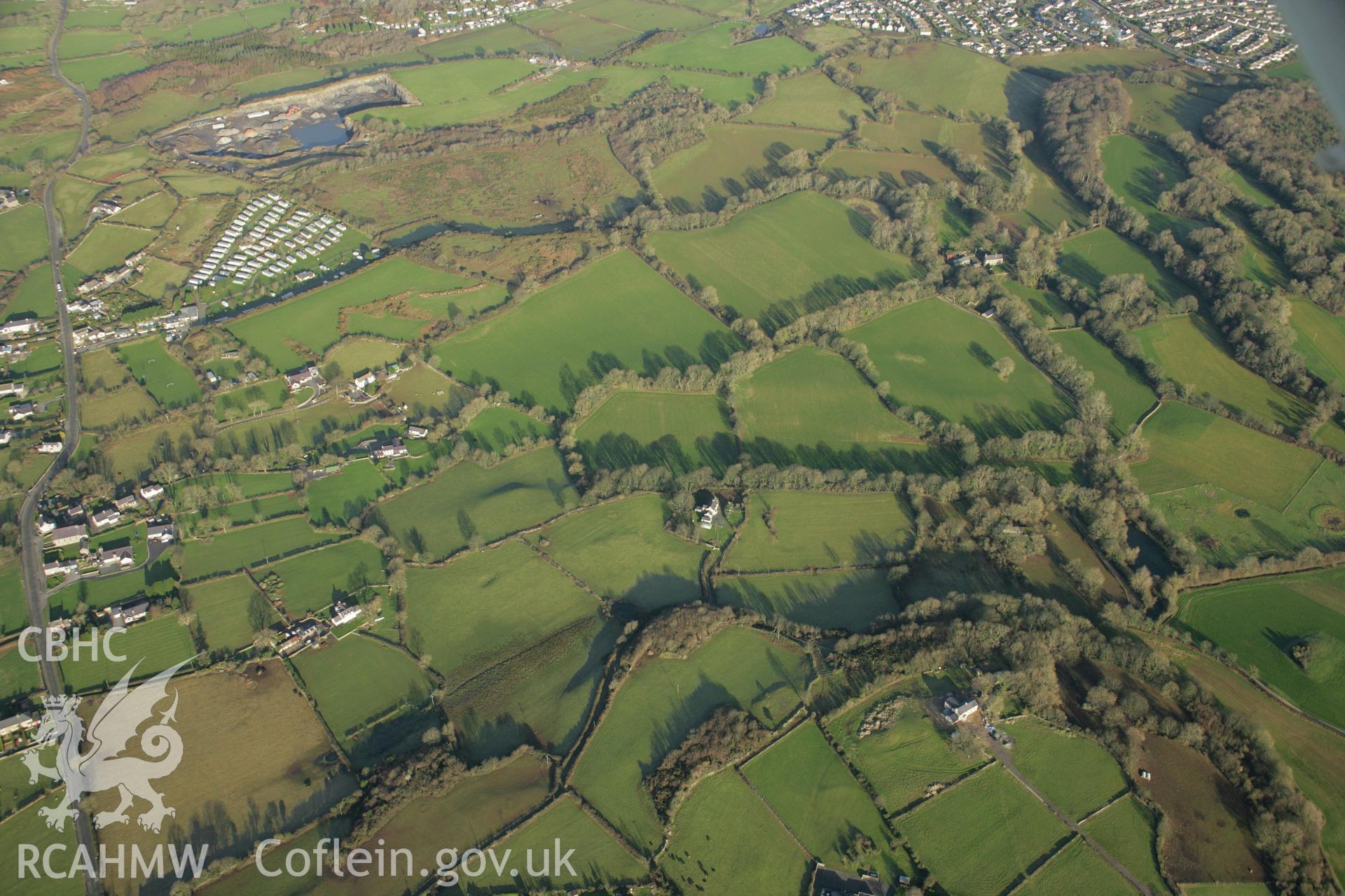 RCAHMW colour oblique aerial photograph of the Viking settlement at Glyn, Llanbedrgoch. Taken on 25 January 2007 by Toby Driver