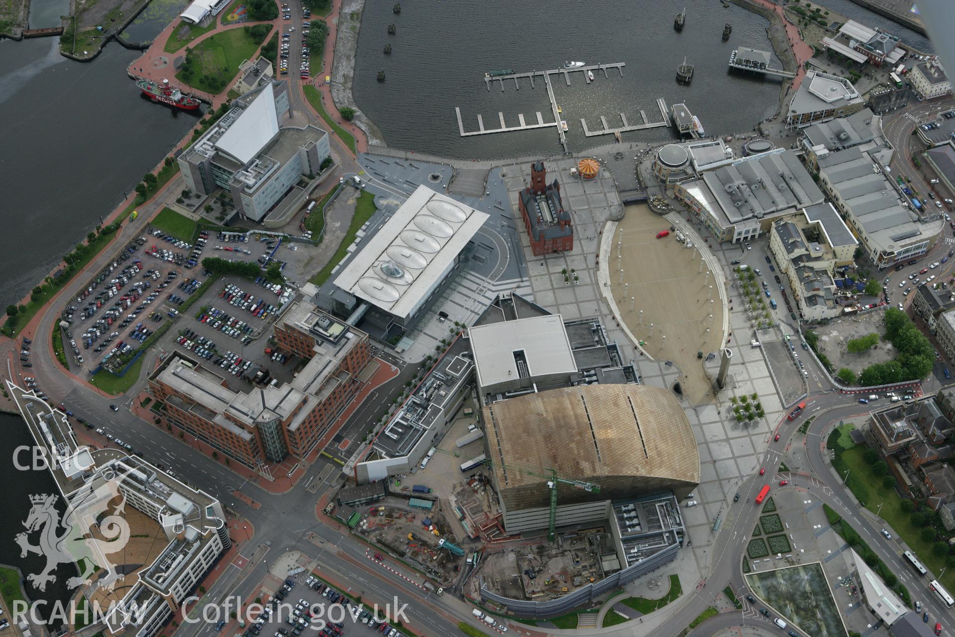 RCAHMW colour oblique aerial photograph of the 'Senedd' Building and Cardiff Bay. Taken on 30 July 2007 by Toby Driver