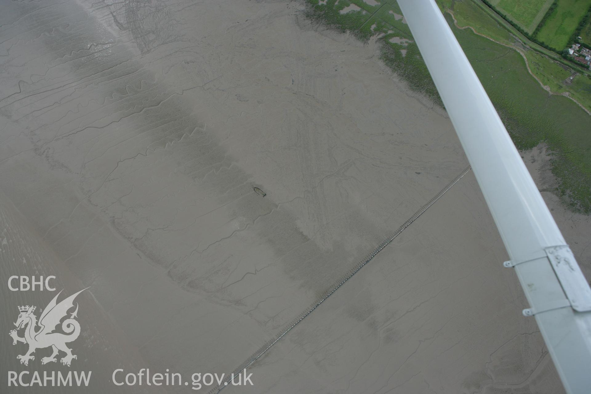 RCAHMW colour oblique aerial photograph of Rumney Great Wharf Wreck. Taken on 30 July 2007 by Toby Driver