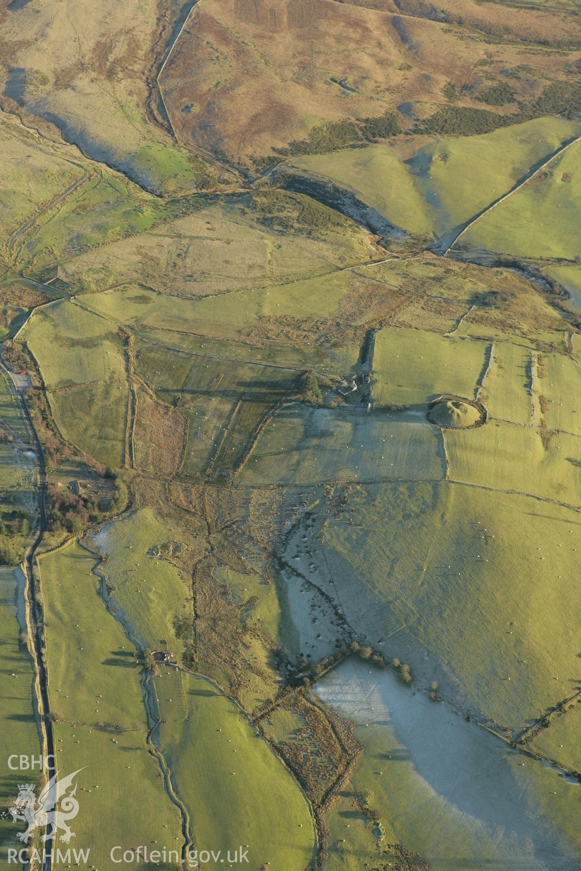 RCAHMW colour oblique photograph of Tomen y Mur Roman military settlement. Taken by Toby Driver on 20/12/2007.