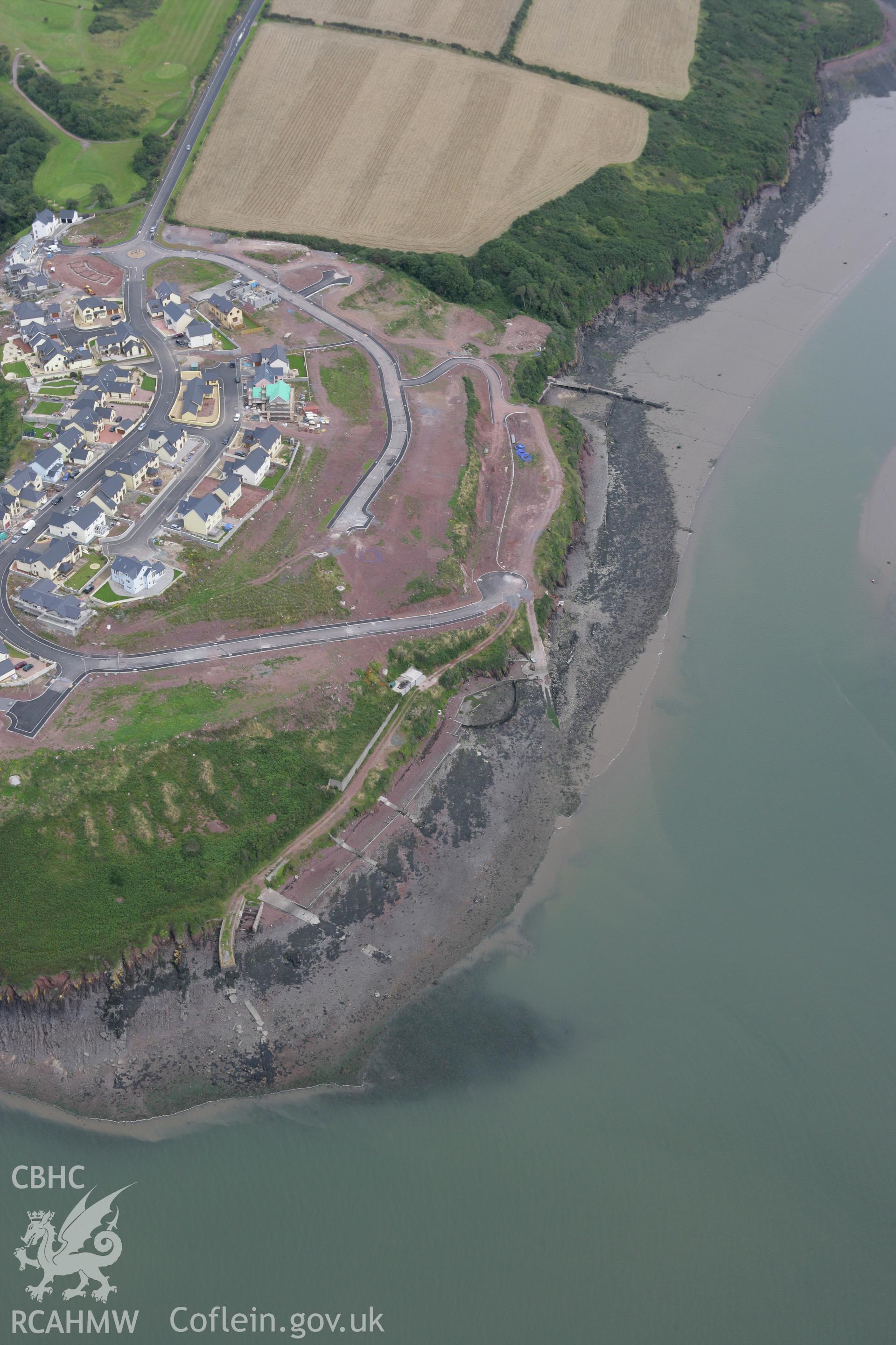 RCAHMW colour oblique photograph of Pennar Point. Taken by Toby Driver on 01/08/2007.