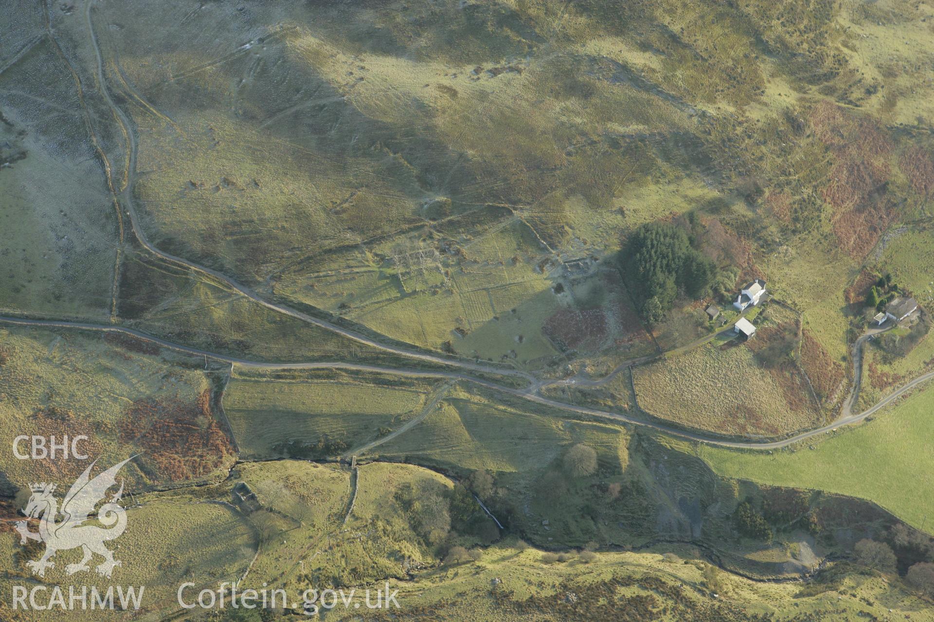RCAHMW colour oblique photograph of housing at Lluest, Cwmystwyth, showing a deserted farm. Taken by Toby Driver on 20/12/2007.