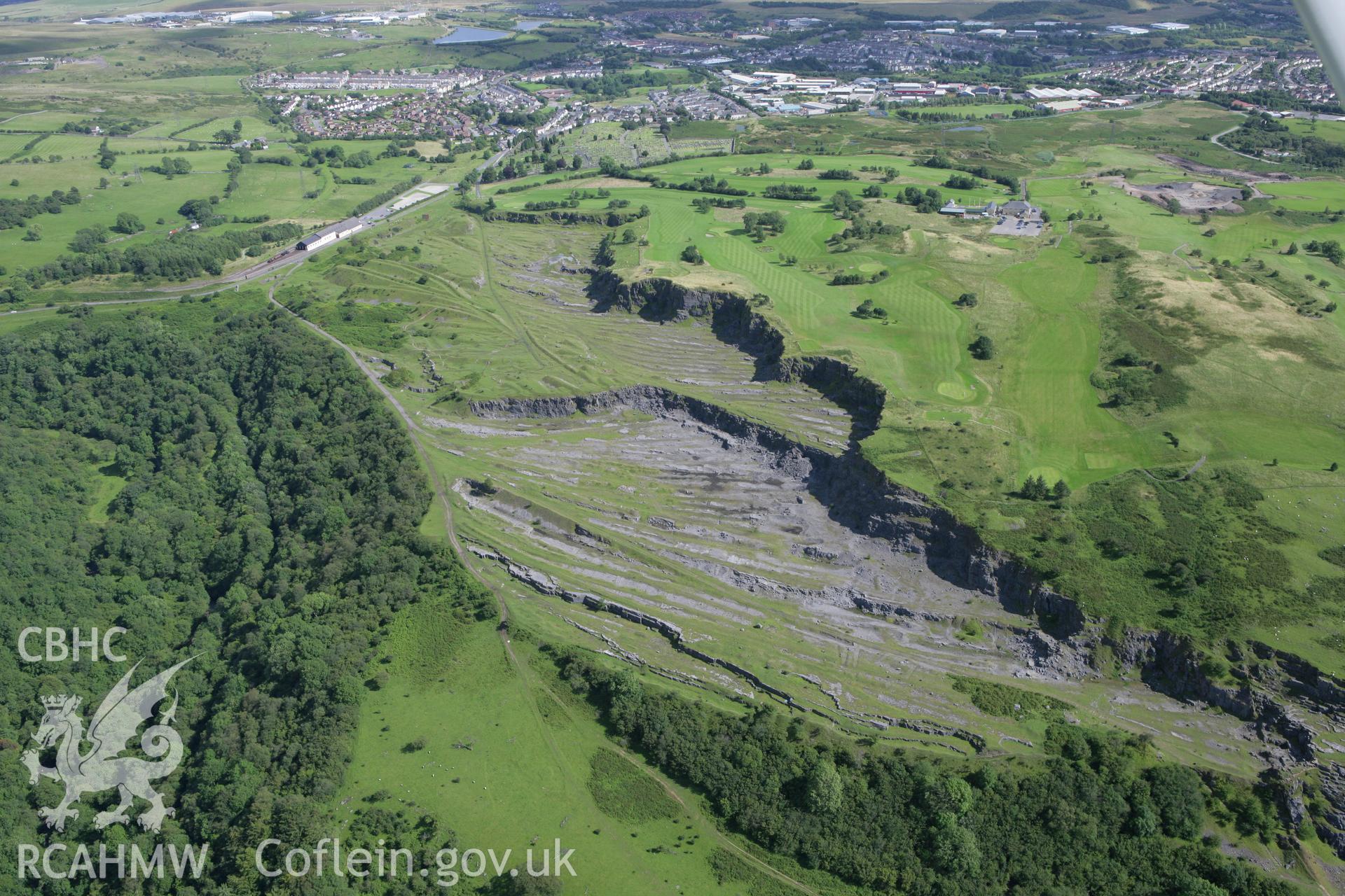RCAHMW colour oblique aerial photograph of Morlais Castle Quarries. Taken on 30 July 2007 by Toby Driver