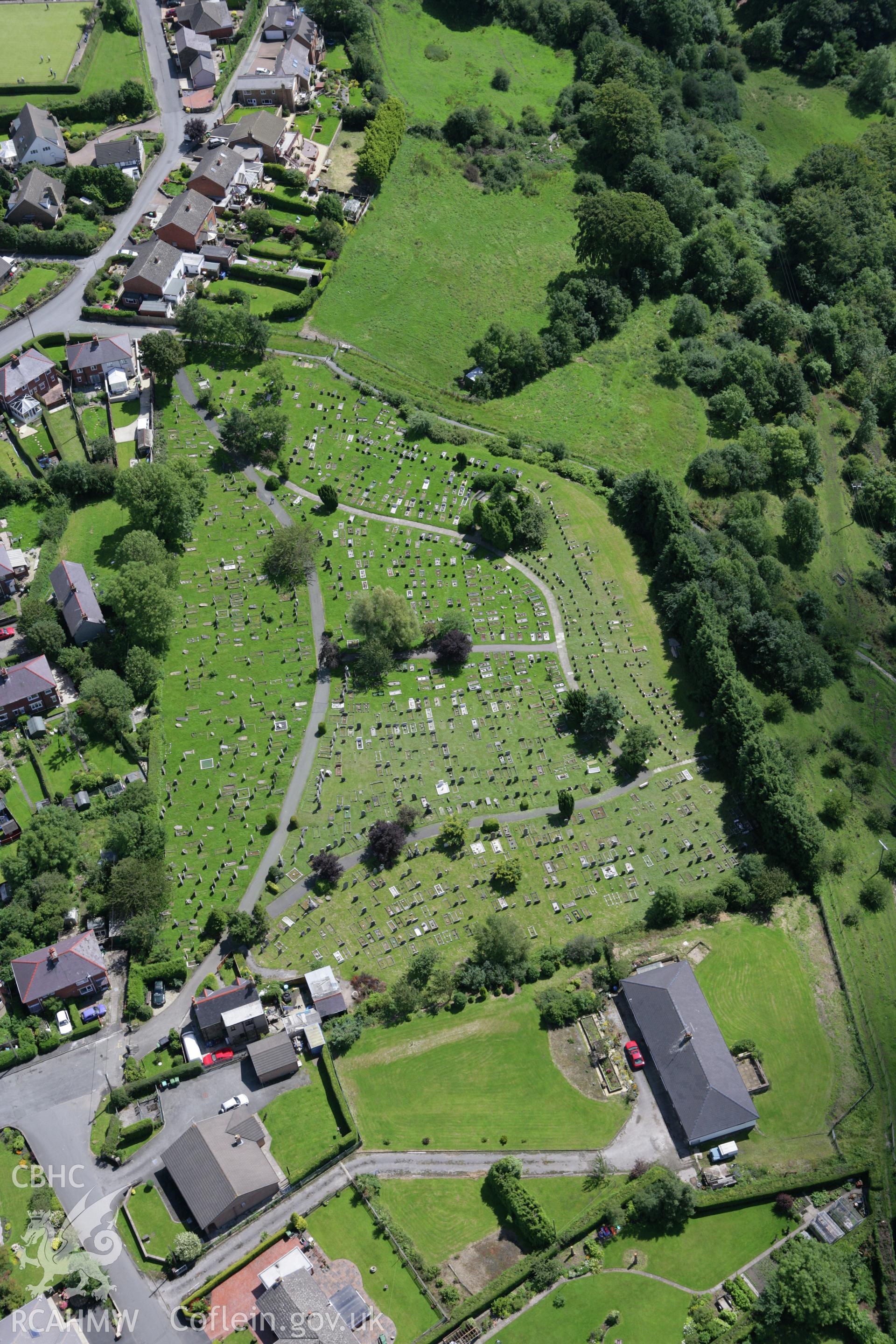 RCAHMW colour oblique aerial photograph of St Tudfil's Church, Coedpoeth. Taken on 24 July 2007 by Toby Driver