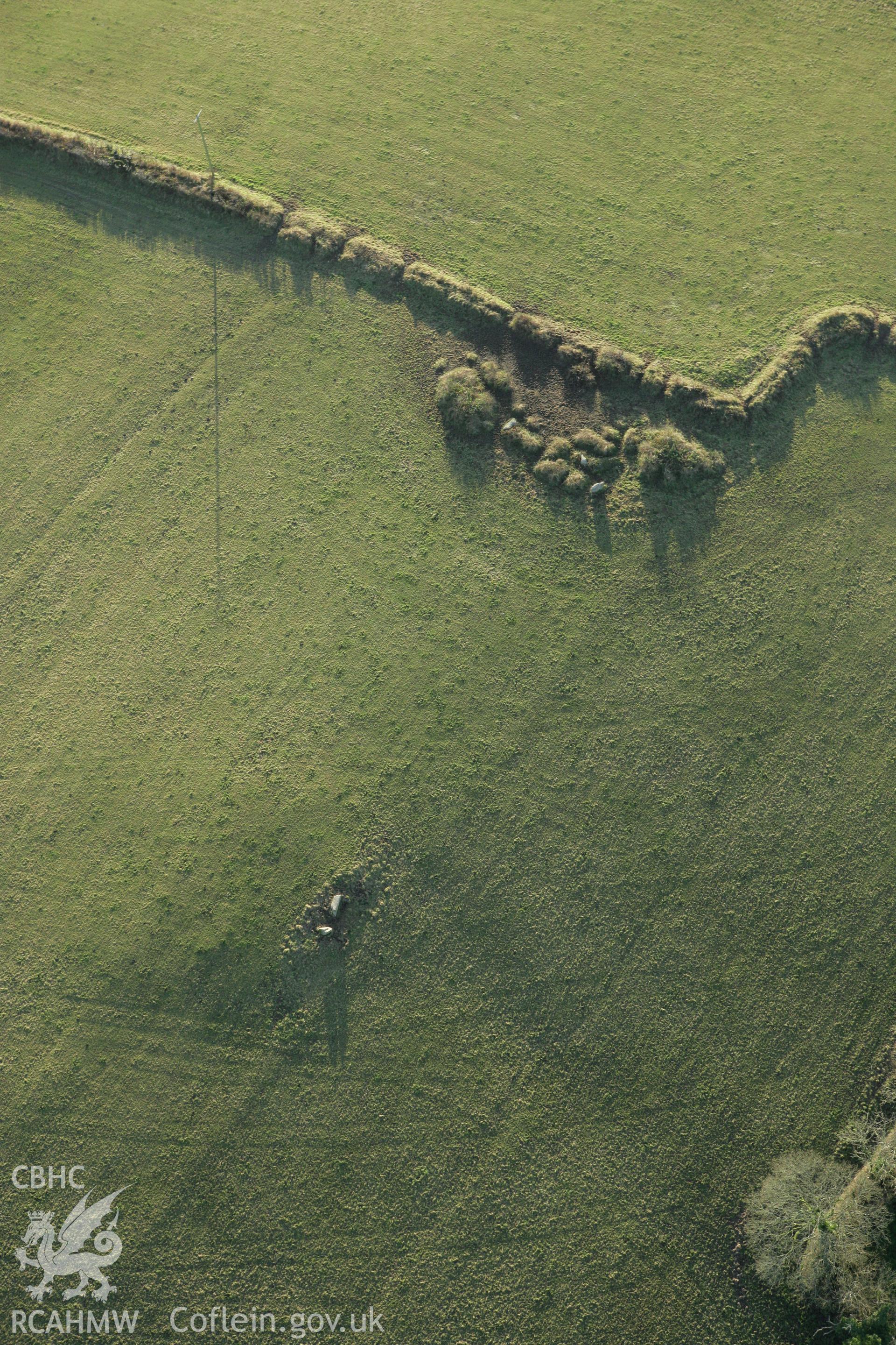 RCAHMW colour oblique photograph of Lan burial chambers. Taken by Toby Driver on 29/11/2007.
