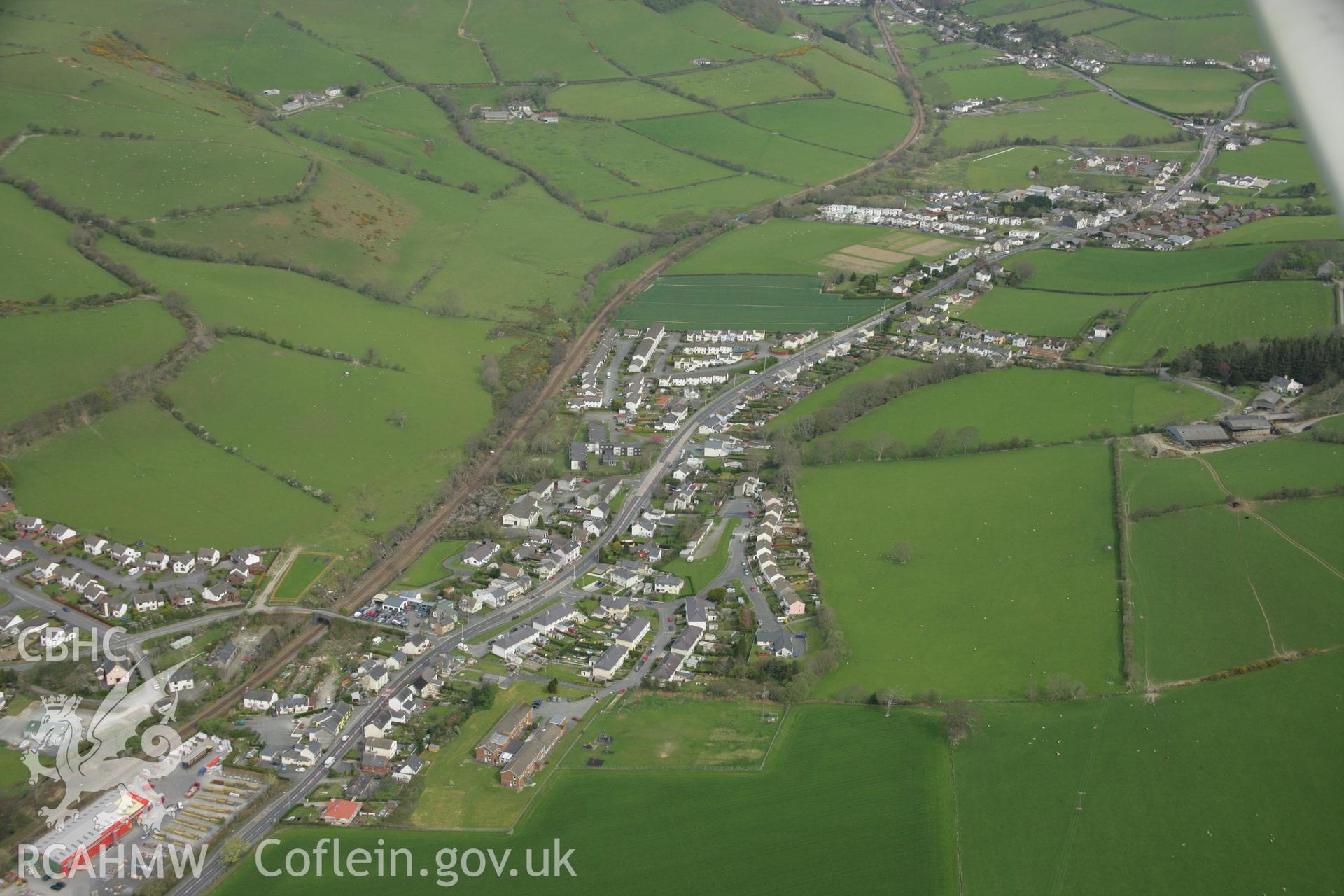 RCAHMW colour oblique aerial photograph of Bow Street Village. Taken on 17 April 2007 by Toby Driver
