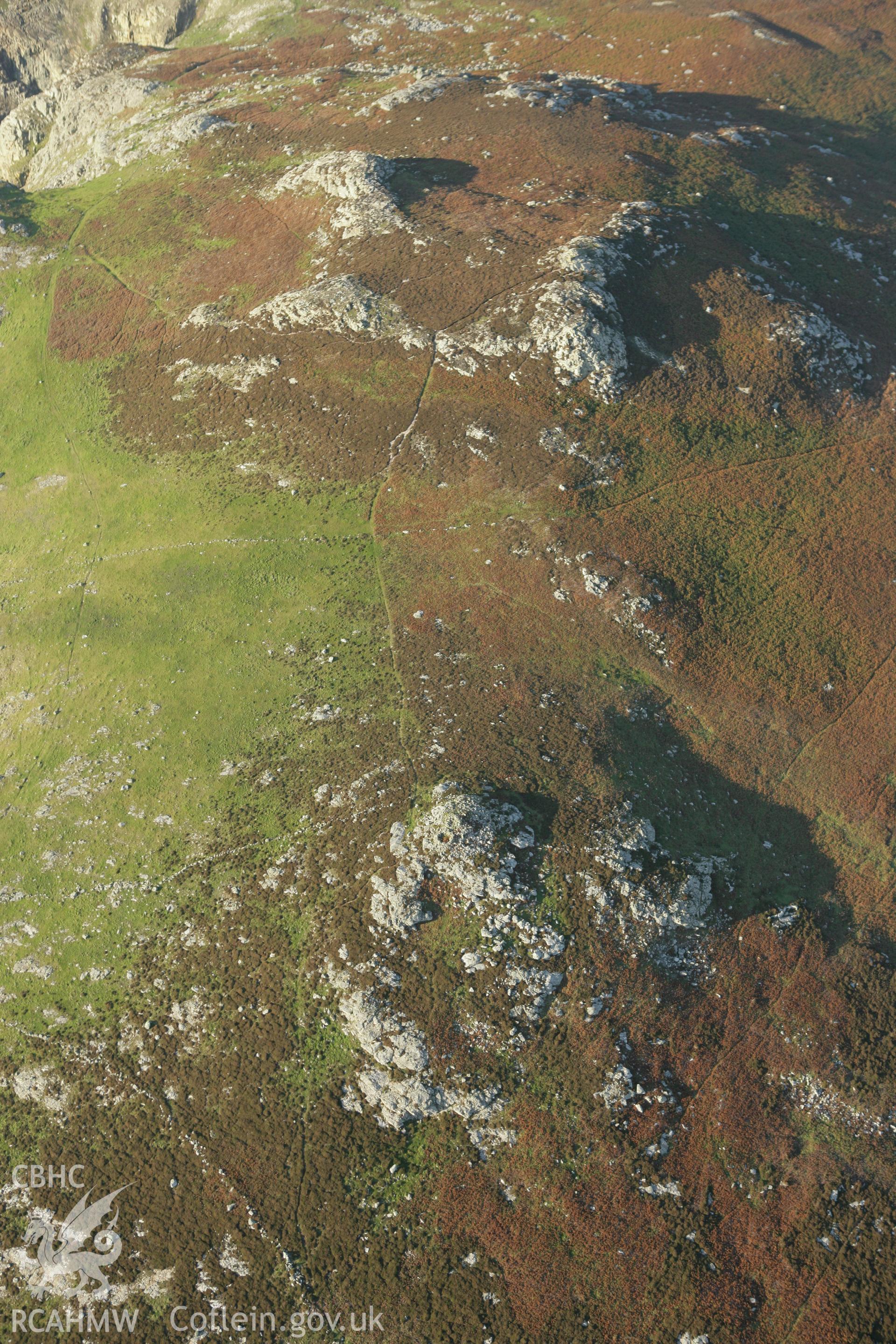 RCAHMW colour oblique photograph of Carn Llundain, Ramsey. Taken by Toby Driver on 23/10/2007.