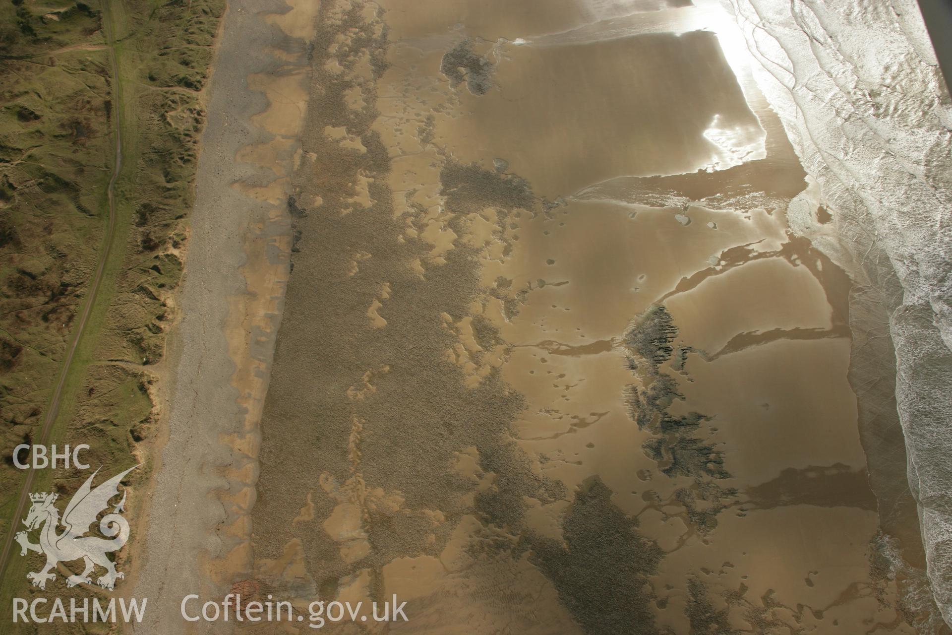 RCAHMW colour oblique aerial photograph of Kenfig Barrows. Taken on 16 March 2007 by Toby Driver