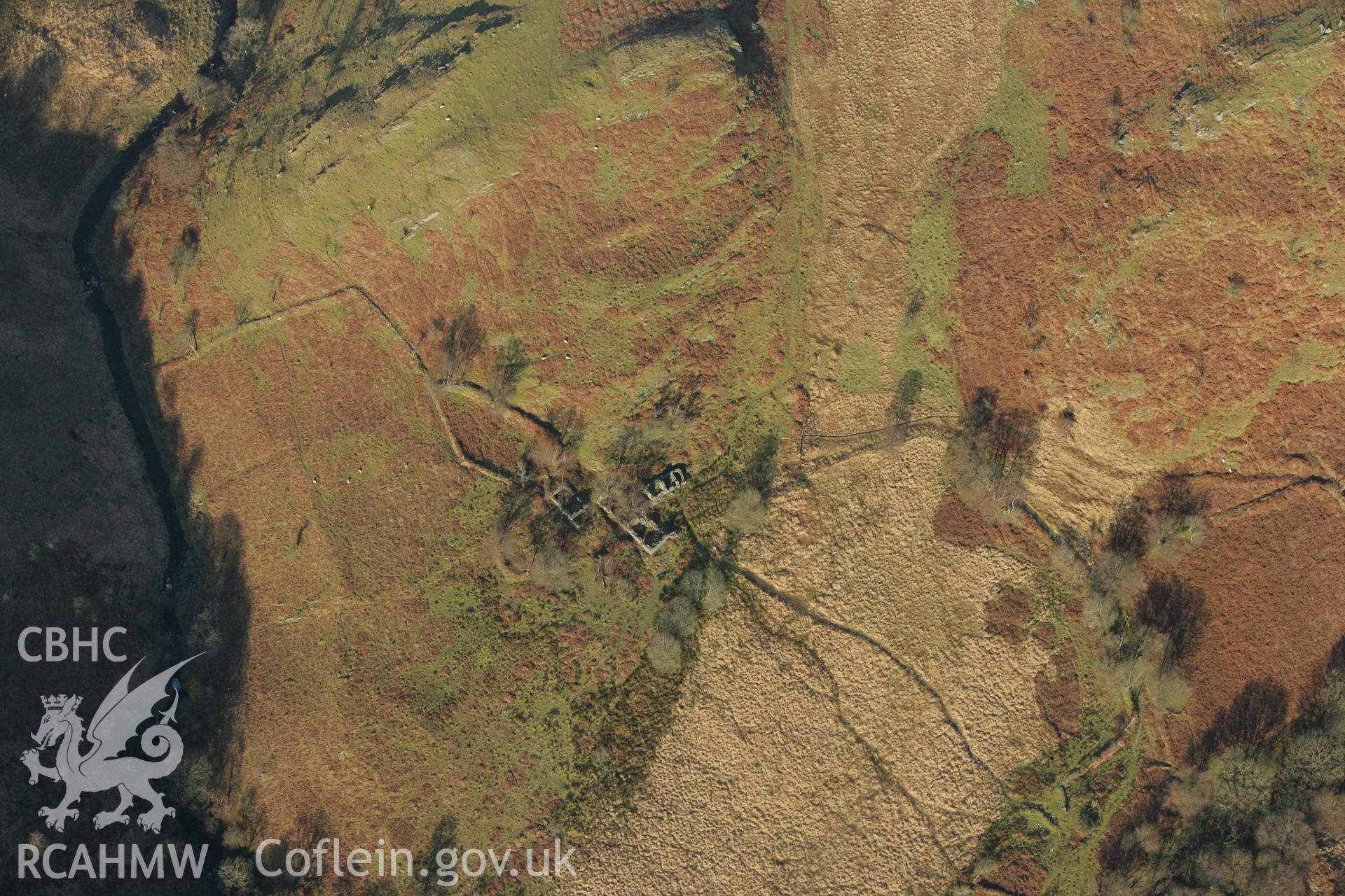 RCAHMW colour oblique photograph of Dinas Foelfraeth farmstead. Taken by Toby Driver on 20/12/2007.