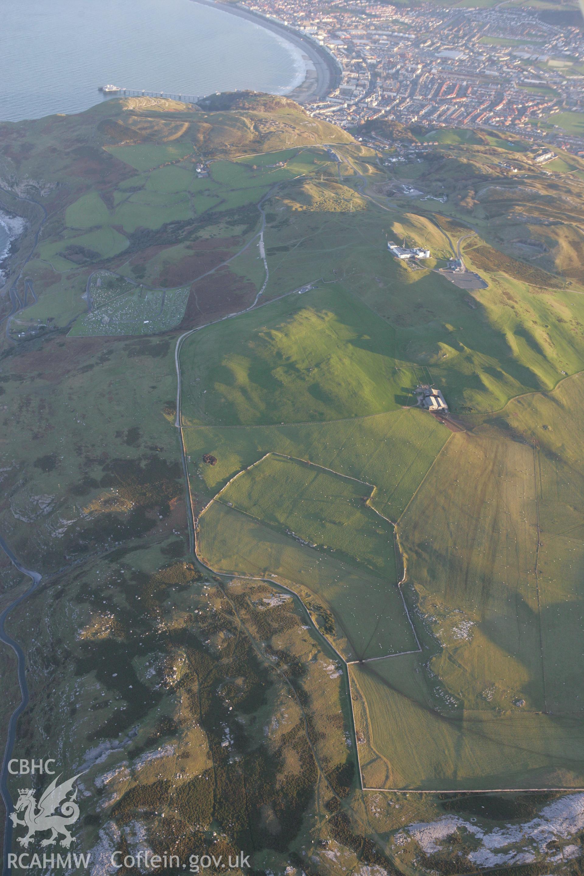 RCAHMW colour oblique photograph of Great Orme and fields to the north of Telegraph Station. Taken by Toby Driver on 20/12/2007.