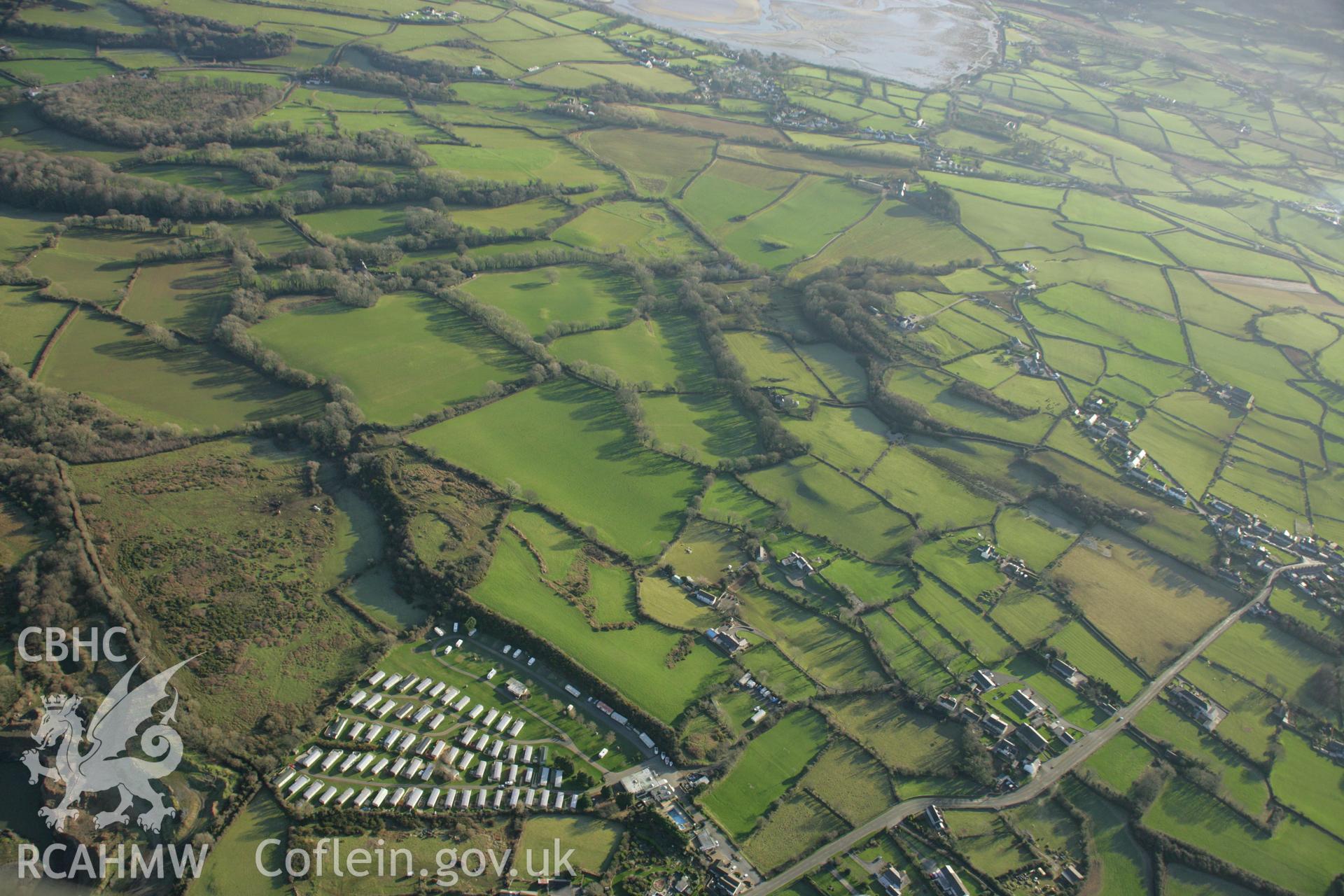 RCAHMW colour oblique aerial photograph of the Viking settlement at Glyn, Llanbedrgoch. Taken on 25 January 2007 by Toby Driver