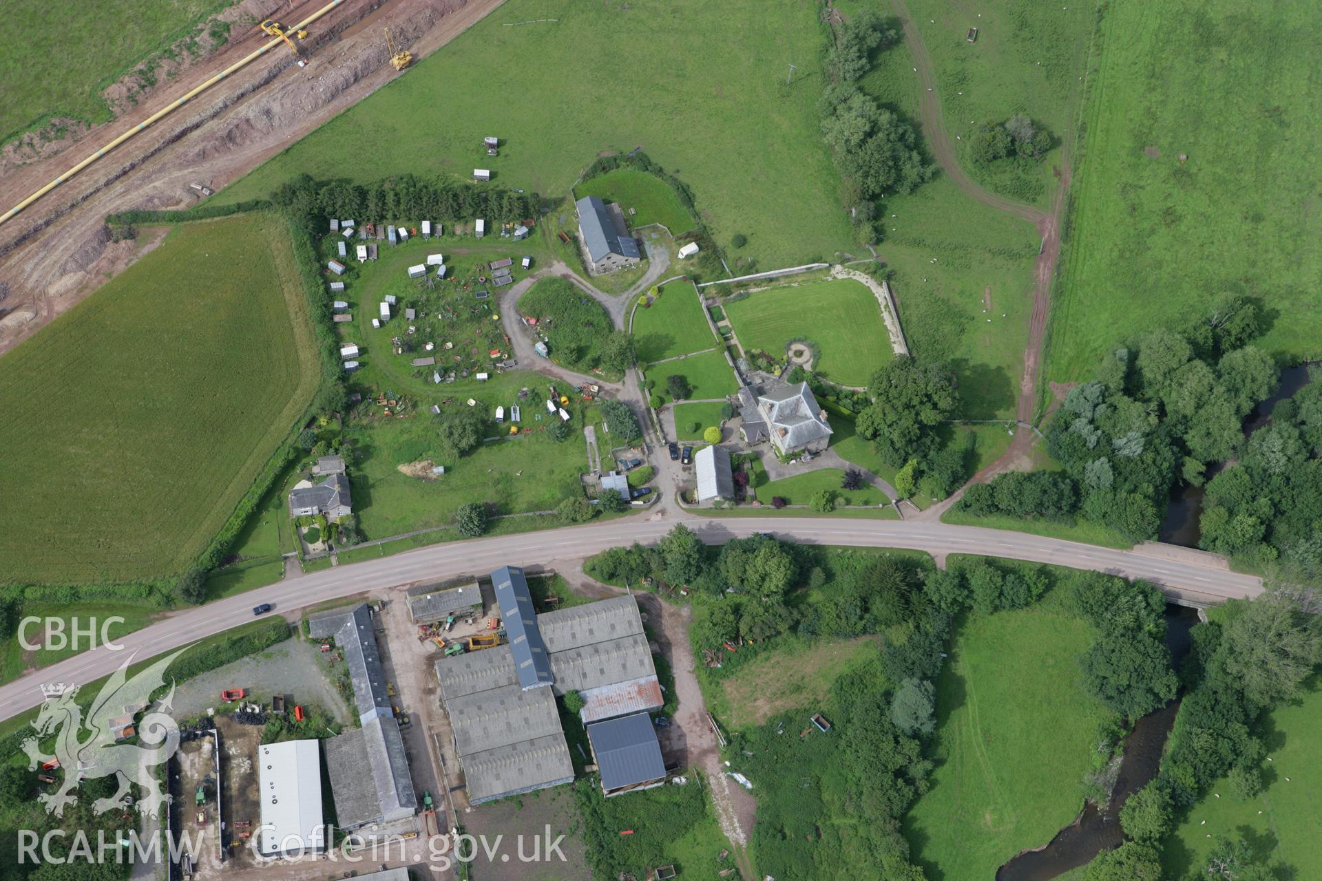 RCAHMW colour oblique aerial photograph of Pipton Mound (Pipton Tower). Taken on 09 July 2007 by Toby Driver