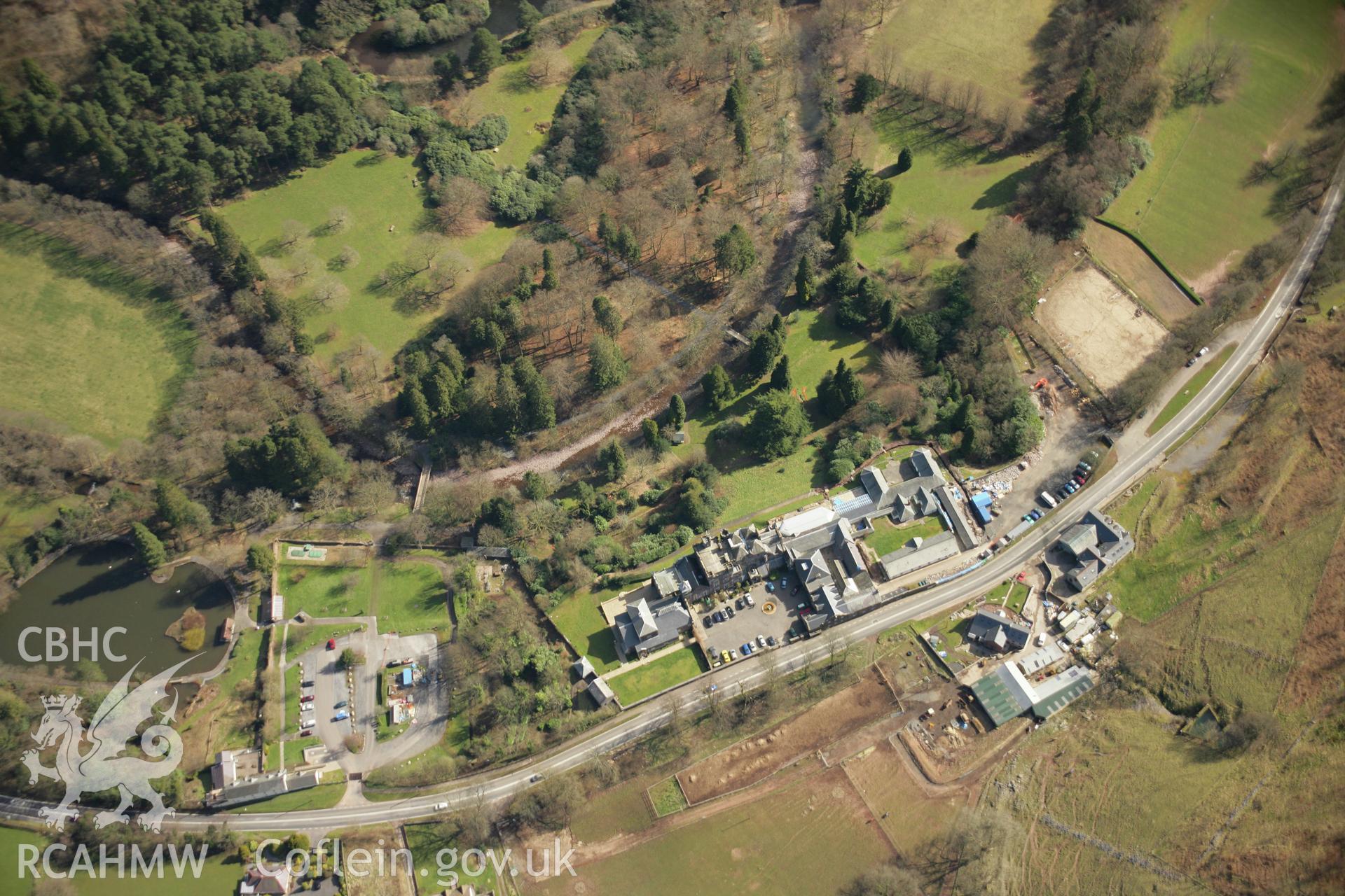 RCAHMW colour oblique aerial photograph of Craig-y-Nos Castle Garden, Glyntawe. Taken on 21 March 2007 by Toby Driver