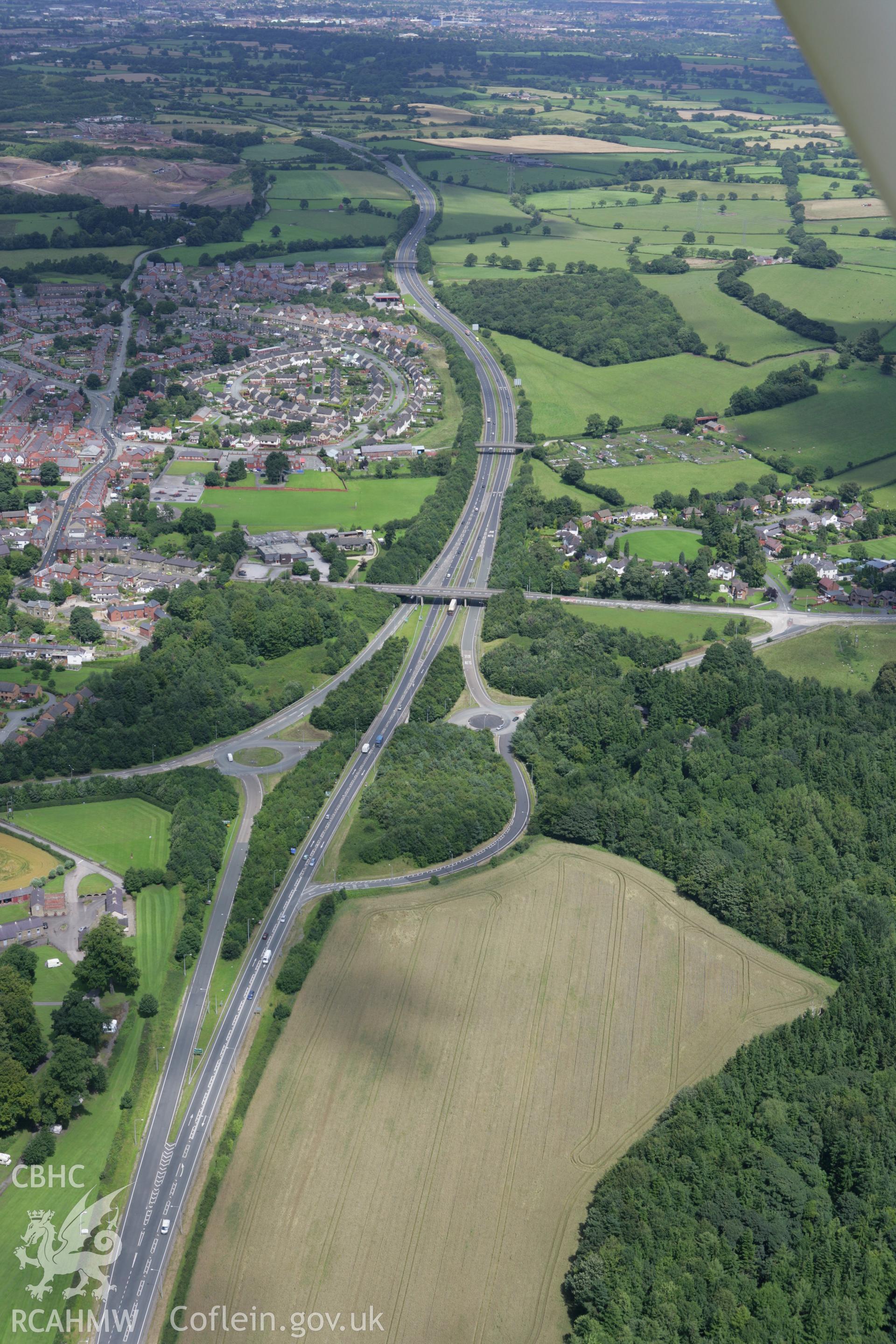 RCAHMW colour oblique aerial photograph of Ruabon from the south west. Taken on 24 July 2007 by Toby Driver