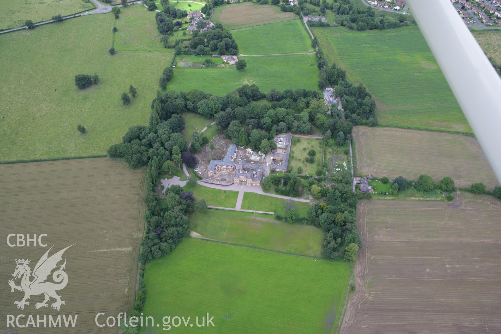 RCAHMW colour oblique aerial photograph of Trevalyn House, Rossett. Taken on 24 July 2007 by Toby Driver