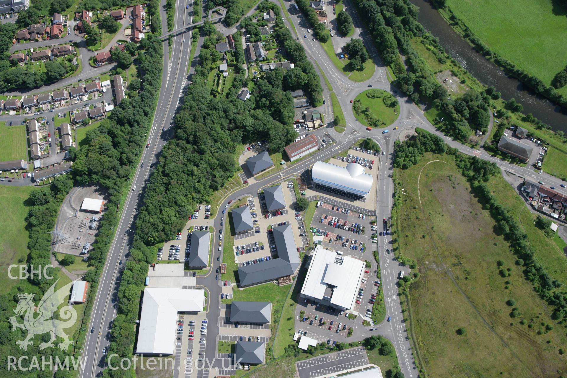 RCAHMW colour oblique aerial photograph of Nantgarw Pottery and industrial estate, Taff's Well. Taken on 30 July 2007 by Toby Driver