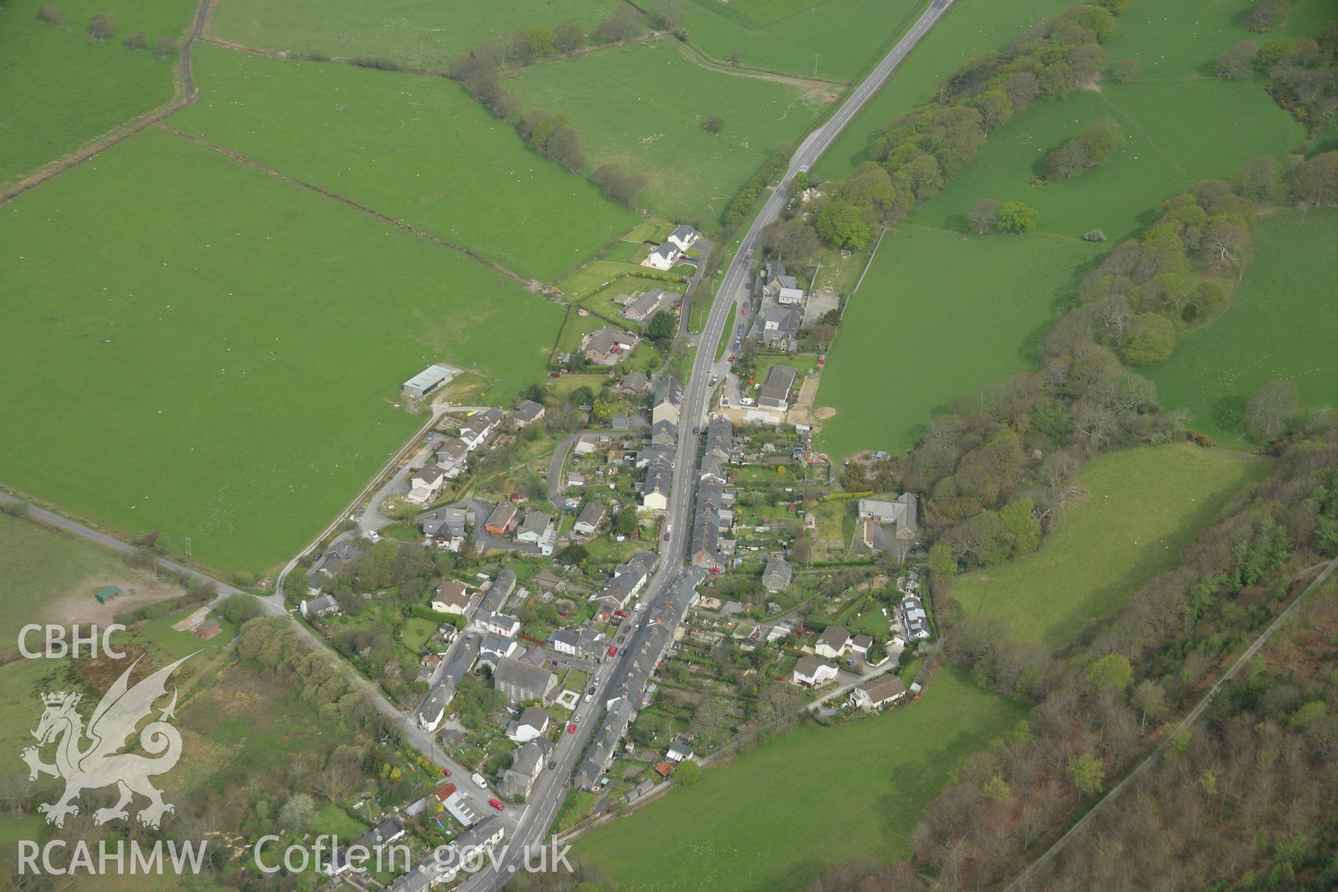 RCAHMW colour oblique aerial photograph of Tre Taliesin. Taken on 17 April 2007 by Toby Driver