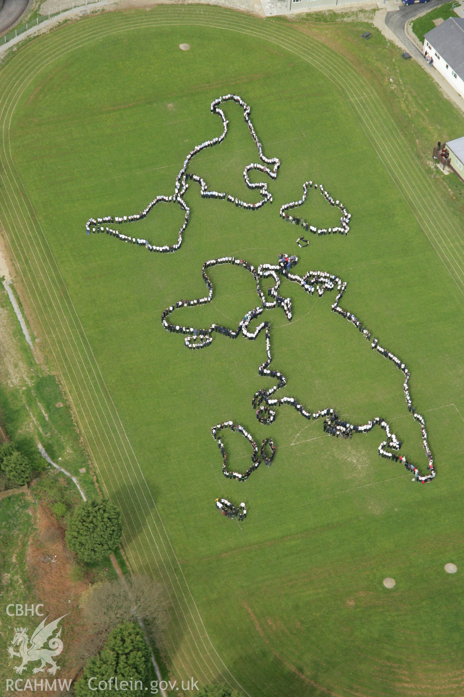 RCAHMW colour oblique aerial photograph of Penglais Comprehensive School, World Map of 1500 pupils. Taken on 17 April 2007 by Toby Driver