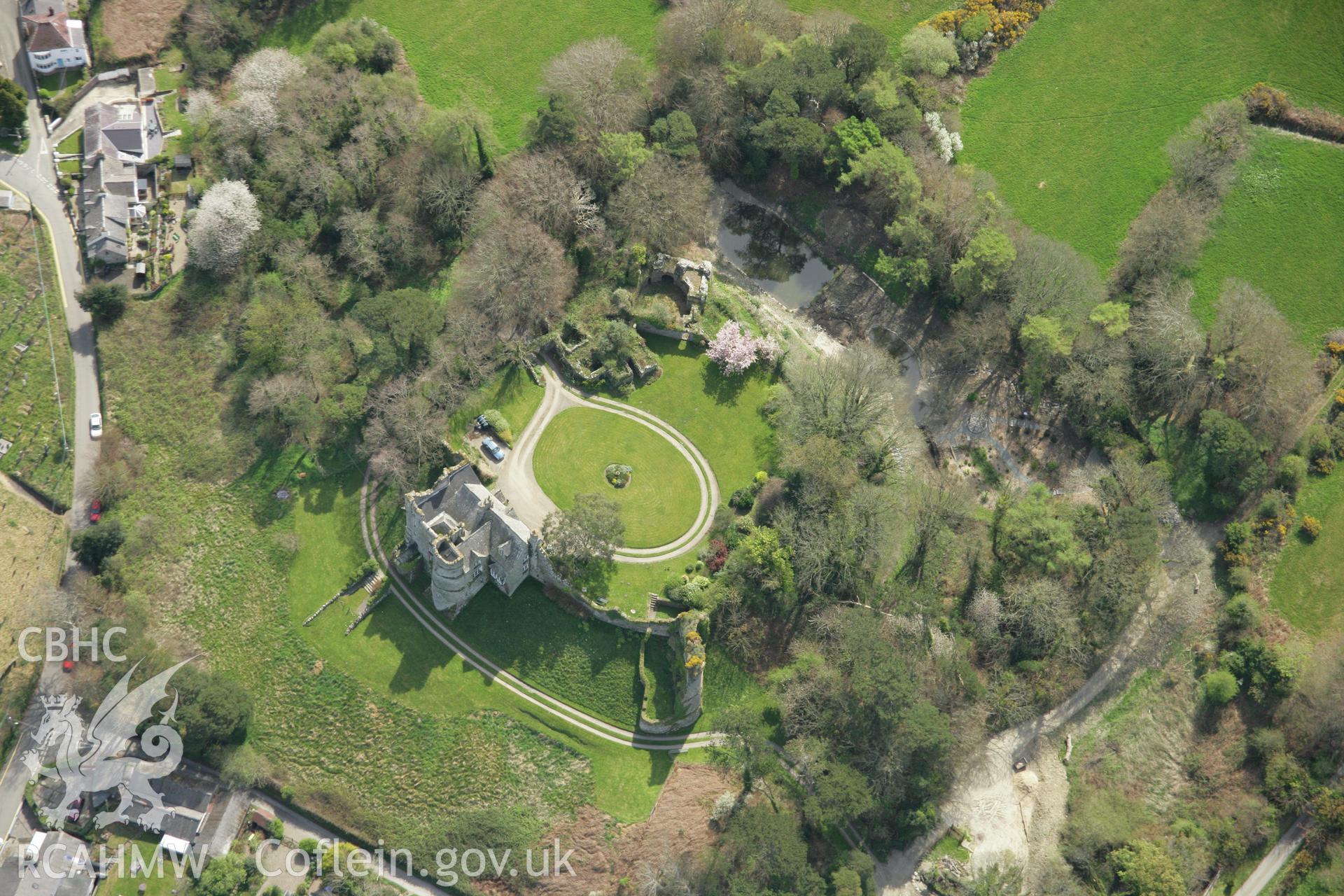 RCAHMW colour oblique aerial photograph of Newport Castle, Pembrokeshire. Taken on 17 April 2007 by Toby Driver