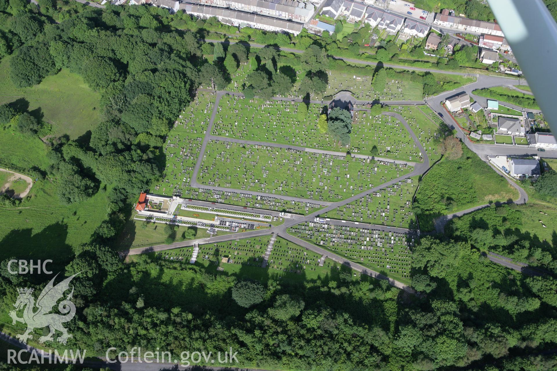 RCAHMW colour oblique aerial photograph of Aberfan Cemetery viewed from the south-west. Taken on 30 July 2007 by Toby Driver